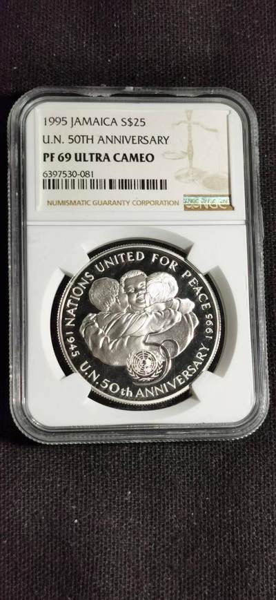 刘世昌艺术品销售中心～虎踞龙蟠*金杨在线联拍群第508期 - 牙买加1995年“联合国成立五十周年”25元纪念精制银币（NGC   PF69UC   串号：6397530-081）1枚。