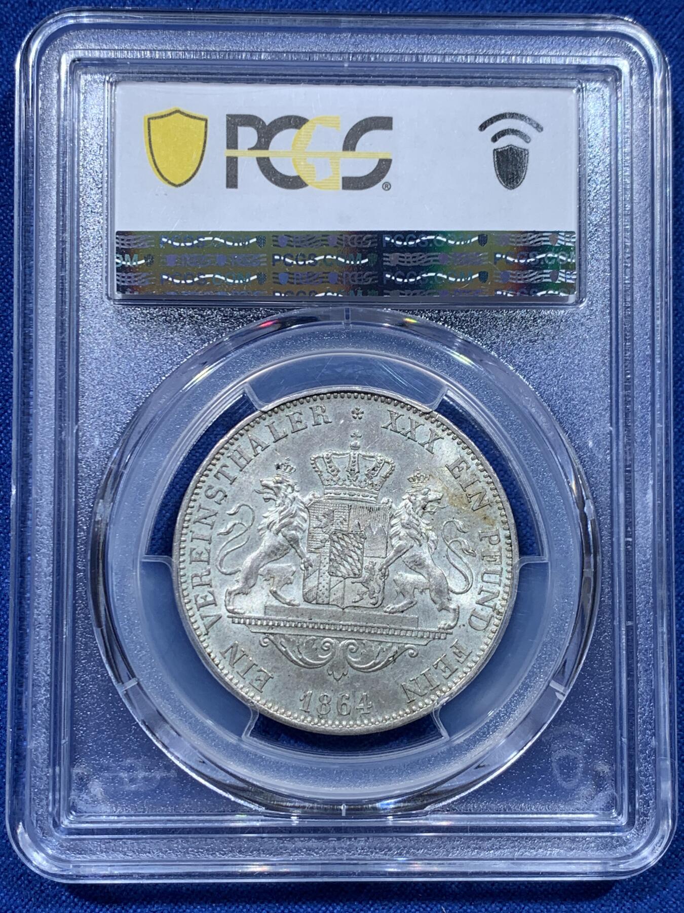 《竞宝斋》第357场 周日，周一  2场连拍 （全场包邮） PCGS MS63 德国1864年巴伐利亚马克西米利安二世 双狮流通1泰勒 发行量最少的年份 封面广告币 淡彩包浆 底板好