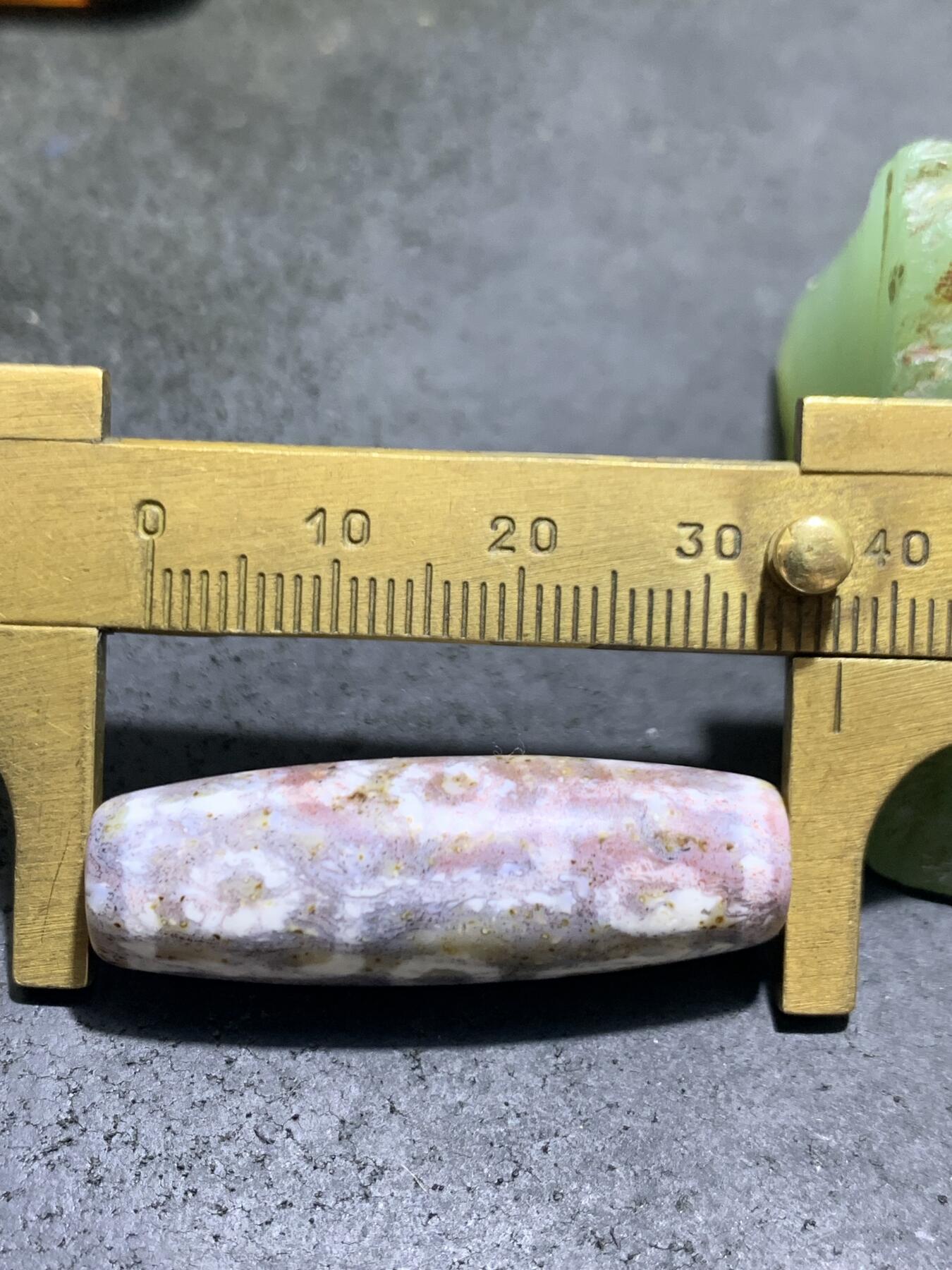 精品藏传象雄朱砂九眼天珠一颗，，