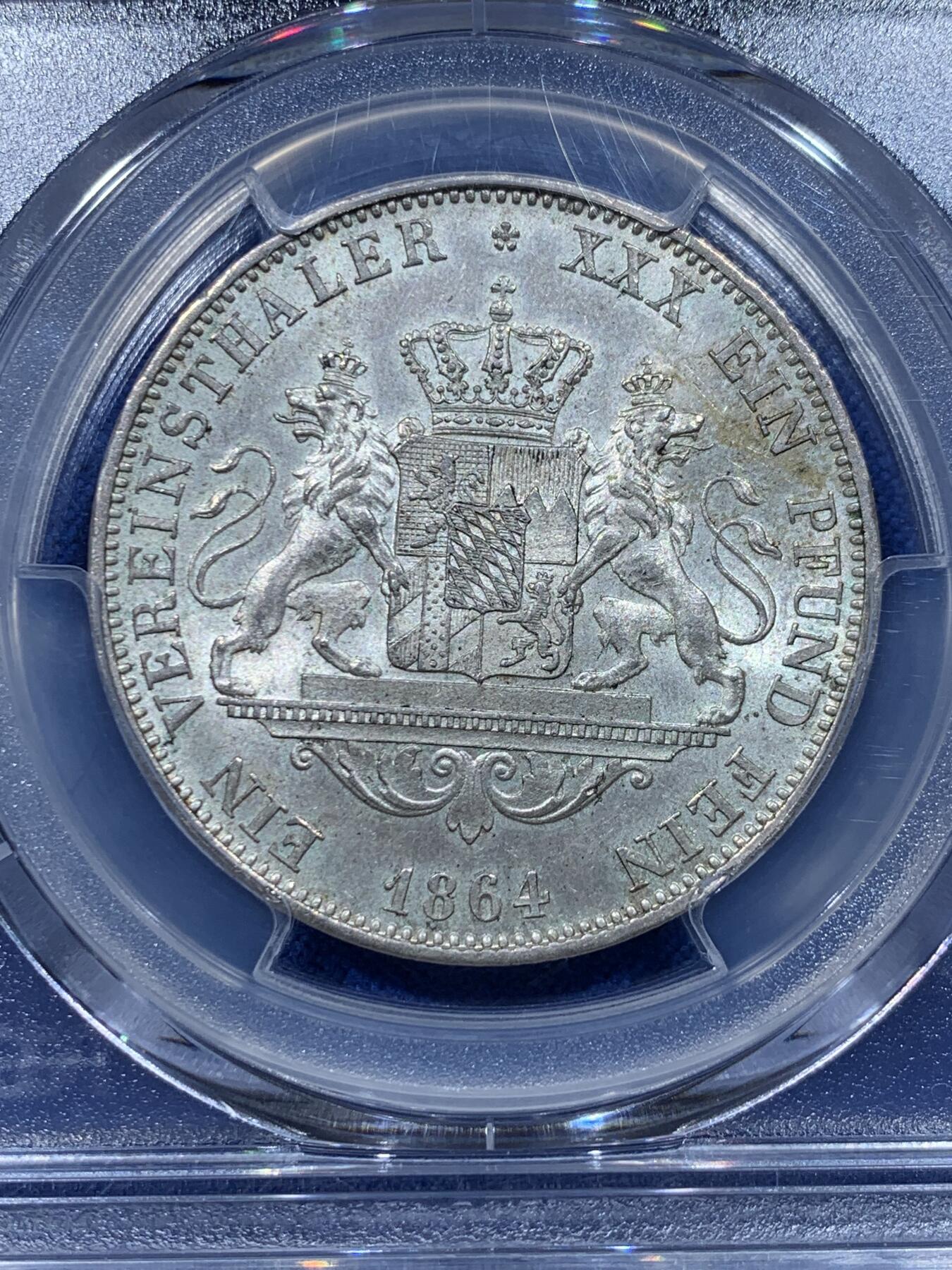 《竞宝斋》第357场 周日，周一  2场连拍 （全场包邮） PCGS MS63 德国1864年巴伐利亚马克西米利安二世 双狮流通1泰勒 发行量最少的年份 封面广告币 淡彩包浆 底板好