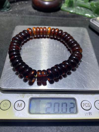 乌克兰血珀随形隔片手串一条 乌克兰血珀随形隔片手串一条