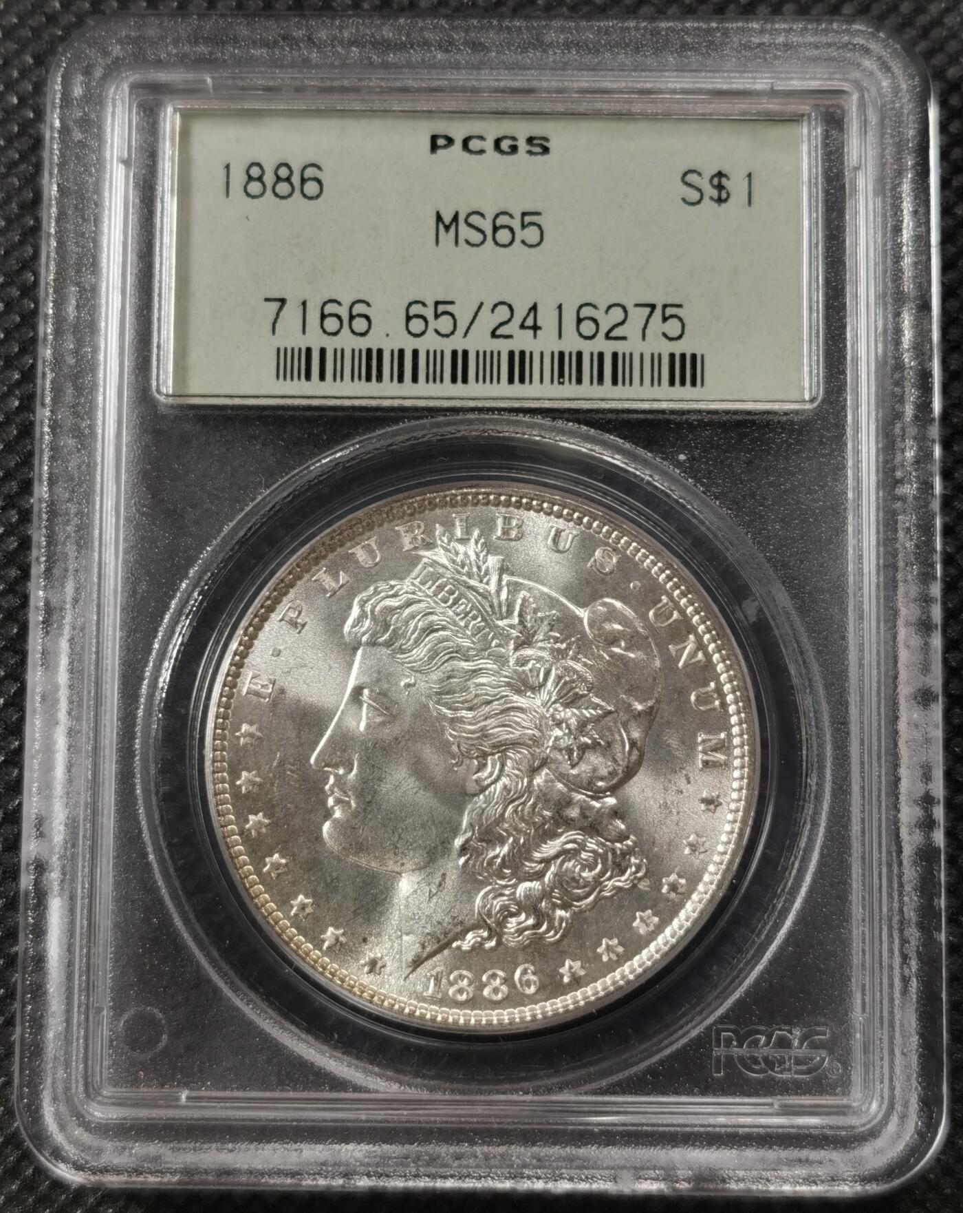 “银华永恒·摩根之光”  甄臻铺-摩根专场（第6期） PCGS-MS65 1886年摩根，经典小绿盒，小月芽包浆品相完美