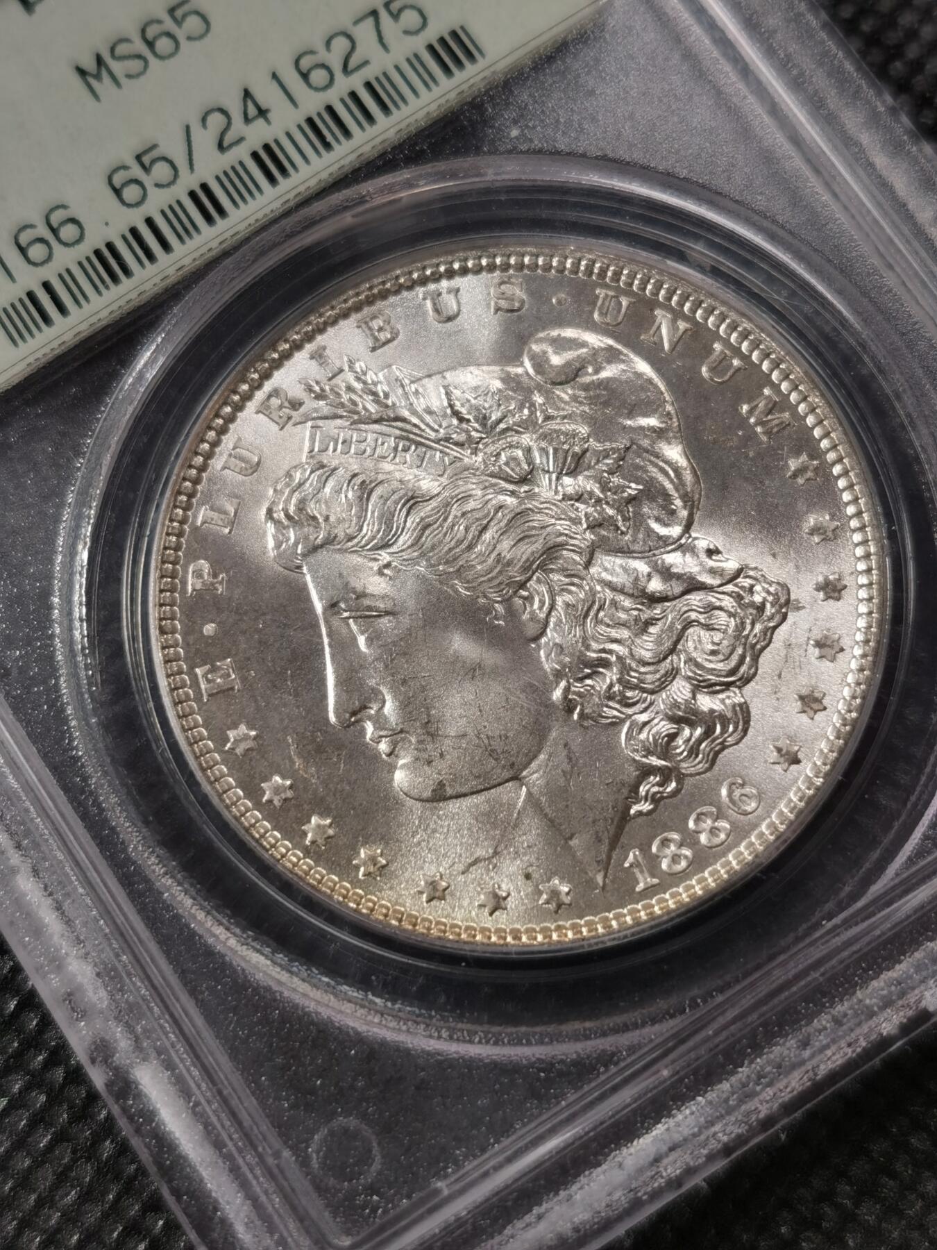 “银华永恒·摩根之光”  甄臻铺-摩根专场（第6期） PCGS-MS65 1886年摩根，经典小绿盒，小月芽包浆品相完美