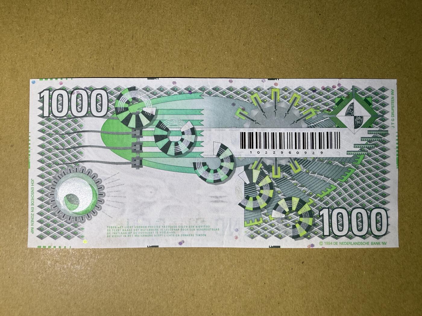 《艾美收藏》(原张总收藏)第189期-周一外币畅拍场 荷兰1000盾 UNC- 大齿轮 无折 透光局部轻微黄 局部荧光 长号码无3547 汇率人民币4000元