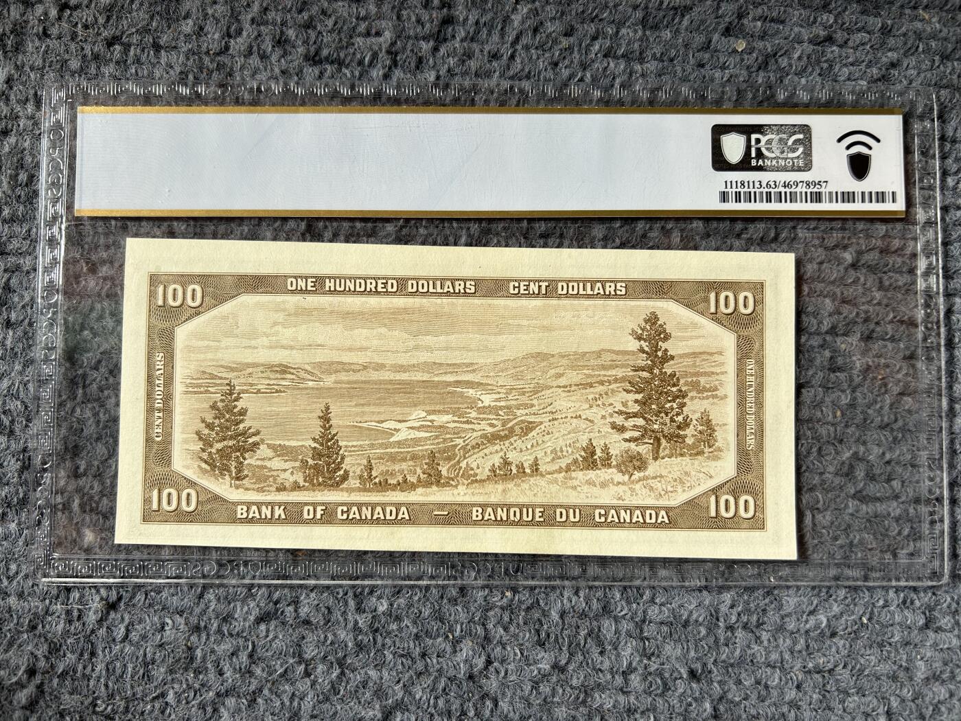收藏联盟Quantum Auction 第410期拍卖 @征集拍品 长期供货可享分佣福利  1954年加拿大100加元 头像修改非魔鬼脸版本 PCGS63PPQ