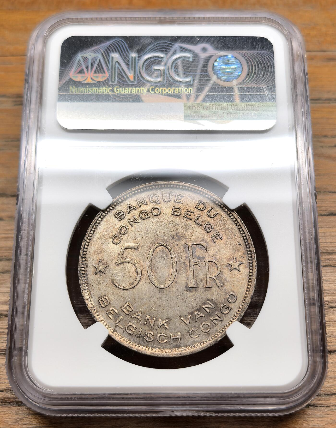 凡希社世界钱币微拍第二百九十八期 1944比属刚果大象50法郎大银NGC-MS62，黄光淡彩。