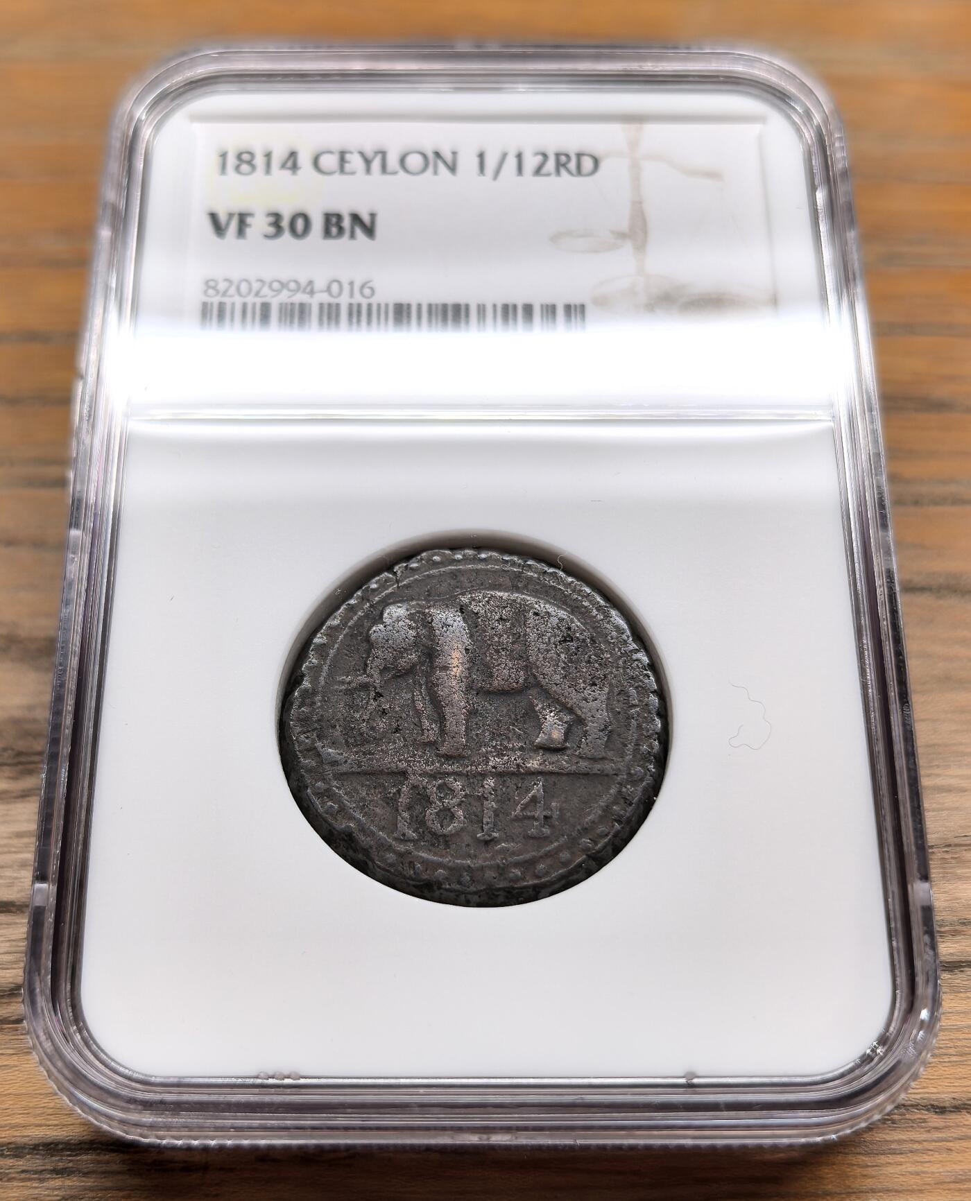 凡希社世界钱币微拍第二百九十八期 1814英属锡兰大象1/12RD铜币NGC-VF30，辅币最大面值，阔大厚重，好品几乎不存在，这枚已是N唯一最高分！
