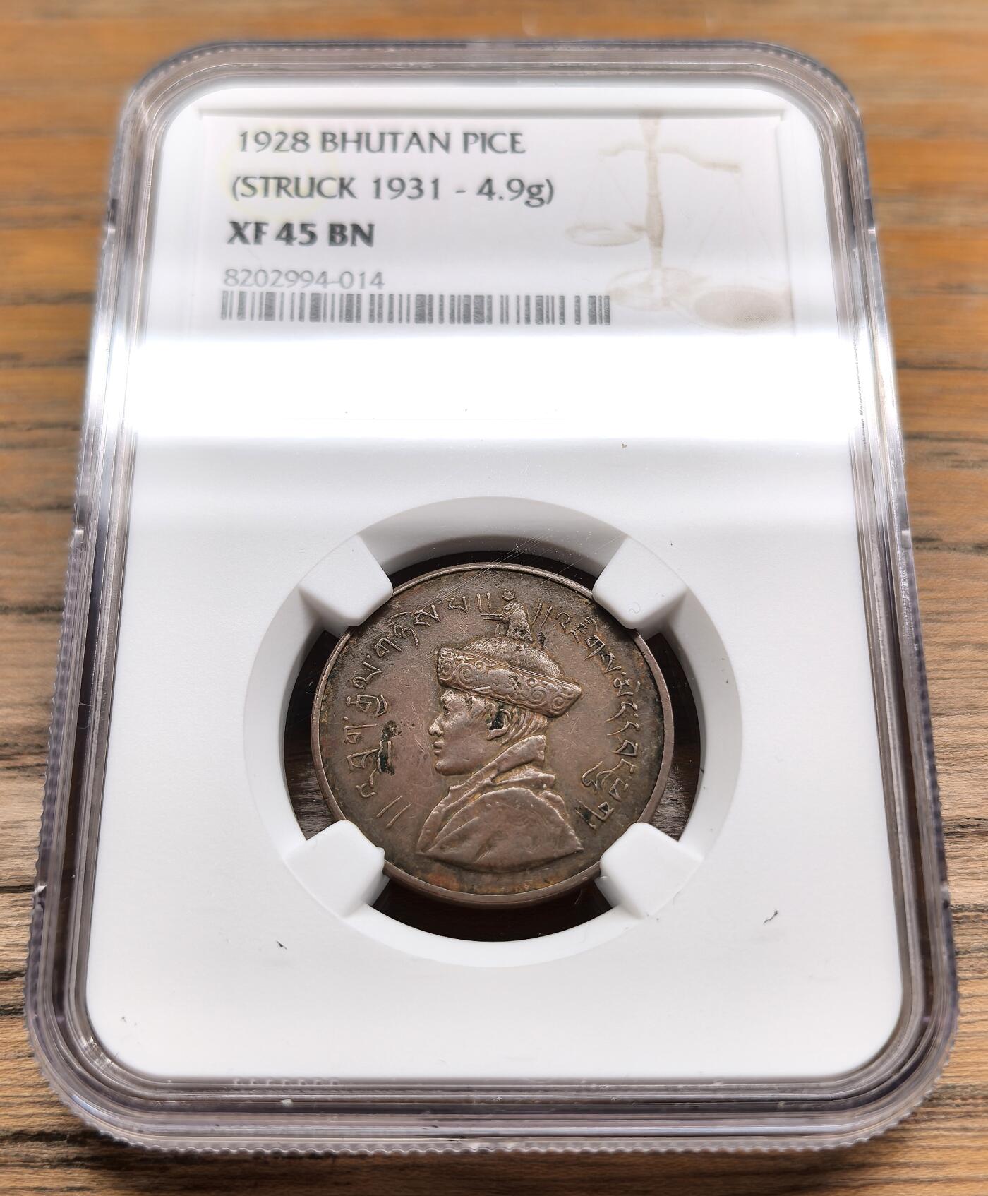凡希社世界钱币微拍第二百九十八期 1928不丹王国PICE铜币NGC-XF45，吉美旺秋与吉祥八宝图，不丹第一种机铸币，好品相当稀少！