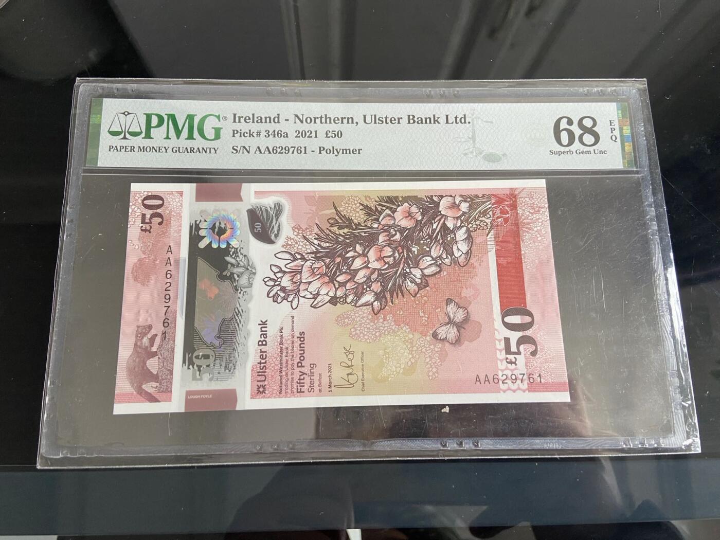【炜奕收藏】，第二十六期 北爱尔兰阿尔斯特50镑，PMG评级68超高分，AA冠号码无4