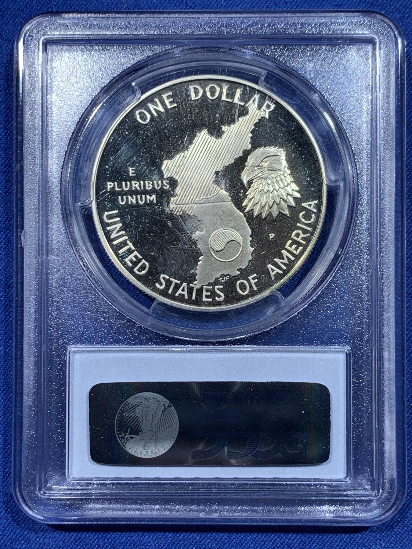 《竞宝斋》第358场 周日，周一  2场连拍 （全场包邮） PCGS PR69DCAM 美国1991年朝战结束38周年纪念银币 正面是海陆空三军，背面是朝韩地图，以纪念那些在朝战中服役的人。PROOF镜面状态精制币，PC盒经典小白盒老盒。