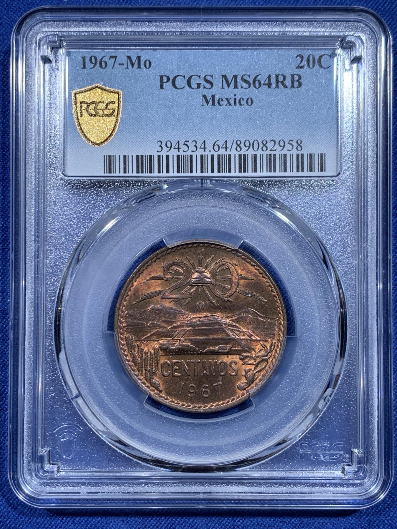 《竞宝斋》第358场 周日，周一  2场连拍 （全场包邮） PCGS MS64RB 1967墨西哥20分铜币 铜光充沛 细节很清晰 划痕少 图案融合了人文景观和自然风光 非常有南美风情 可藏