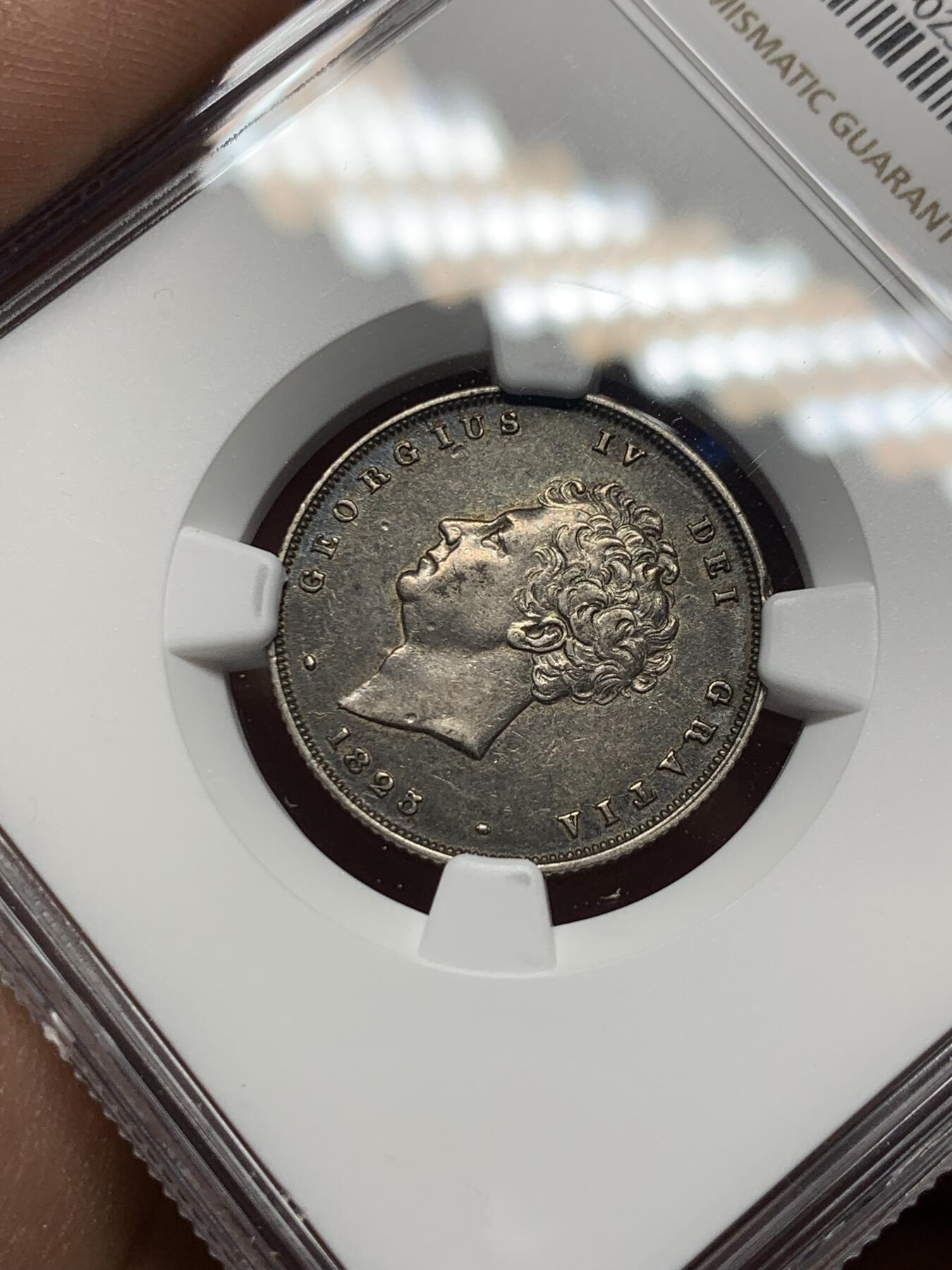《竞宝斋》第358场 周日，周一  2场连拍 （全场包邮） NGC XF45 英国1825年乔治四世1先令银币 酱彩包浆 出分不易 背面的小狮子很可爱