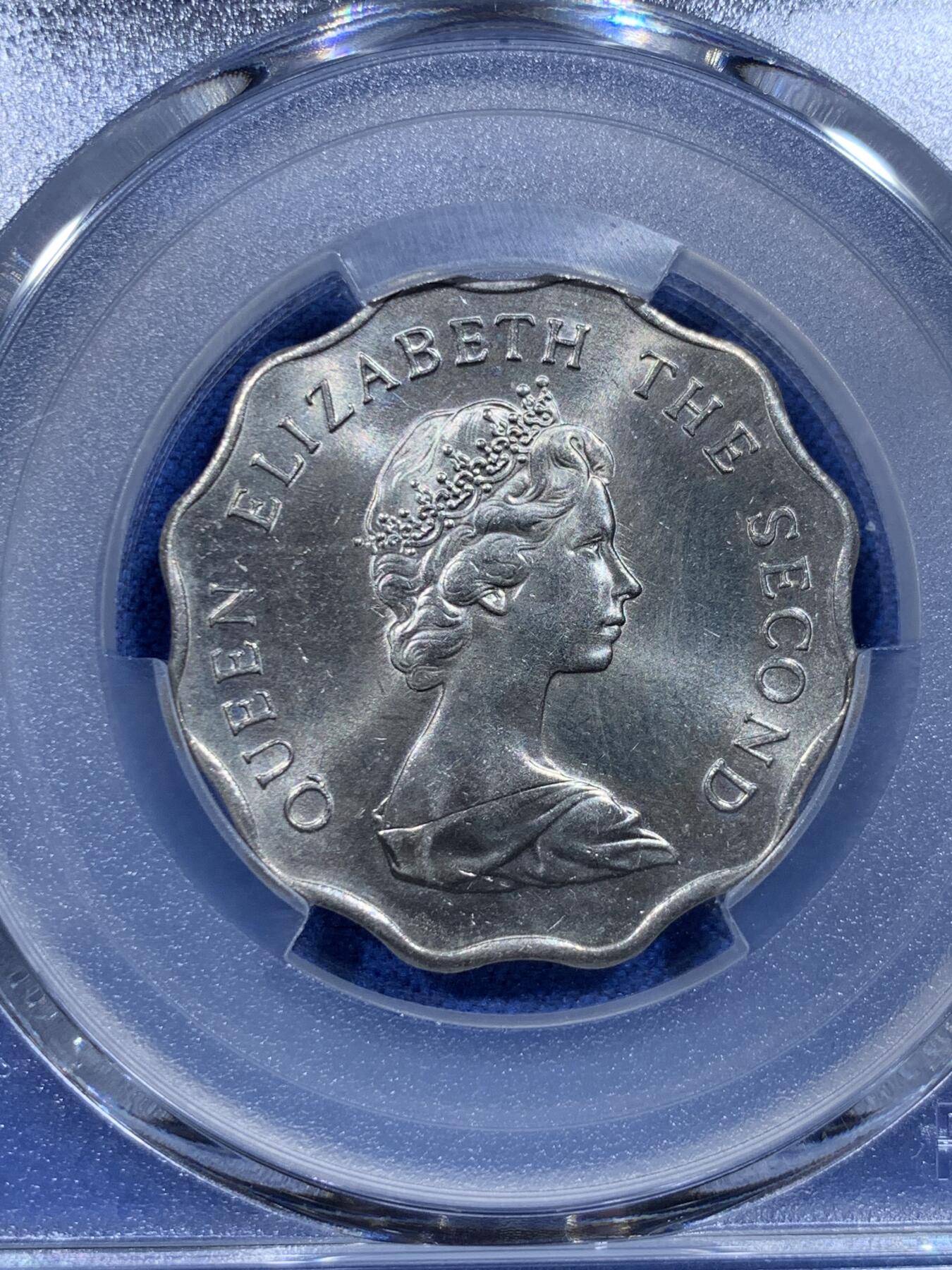 《竞宝斋》第358场 周日，周一  2场连拍 （全场包邮） PCGS MS64 低评！1981香港2元镍币 两面转光 细节清晰 品相很不错 年份比较少见 不是1975这种大路货