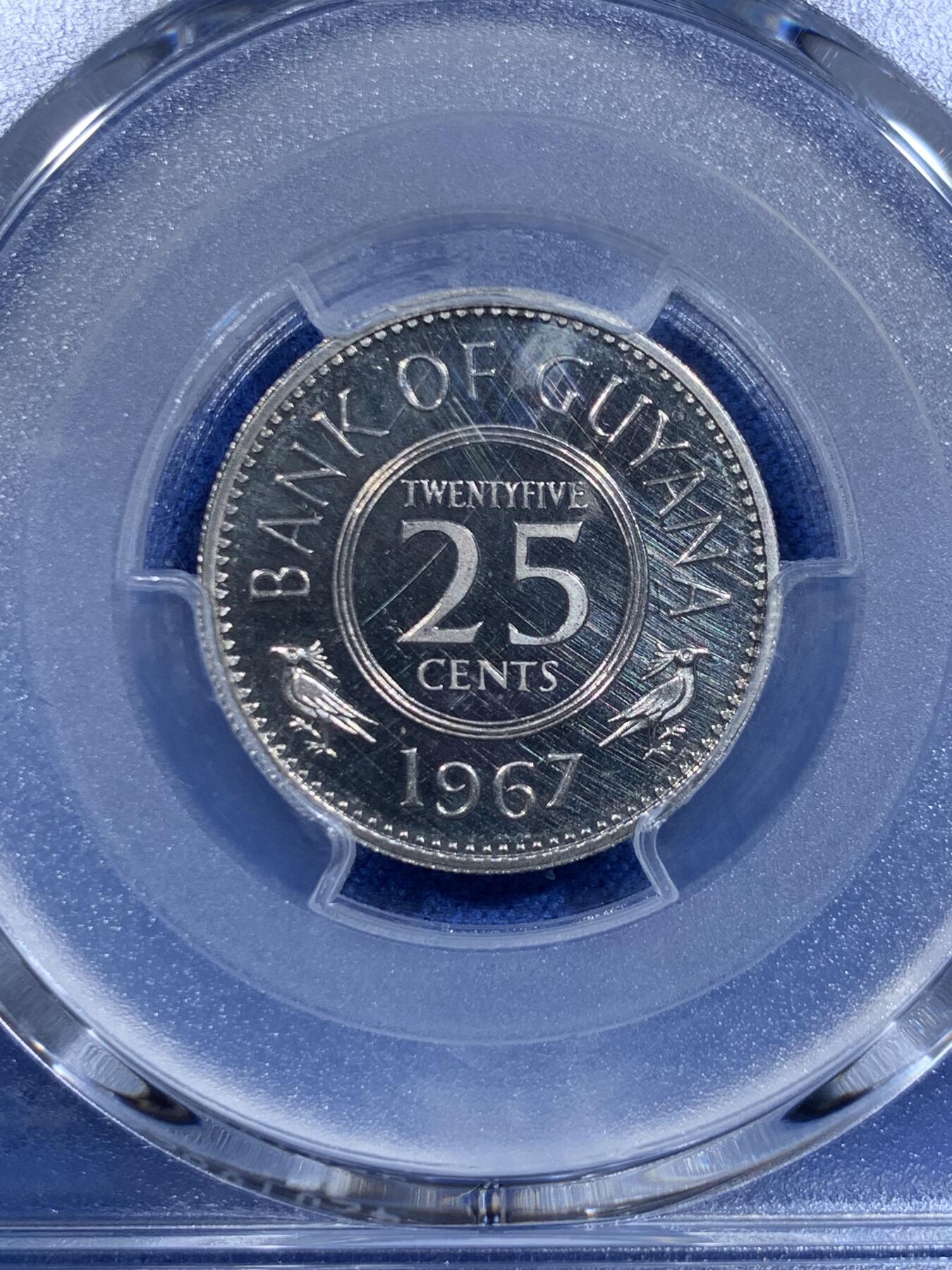 《竞宝斋》第358场 周日，周一  2场连拍 （全场包邮） PCGS PR64CAM 1967圭亚那25分精制币 挺少见的品种 图案富有特色 工艺一般 64已经算不错的分了 有CAM挺少见的
