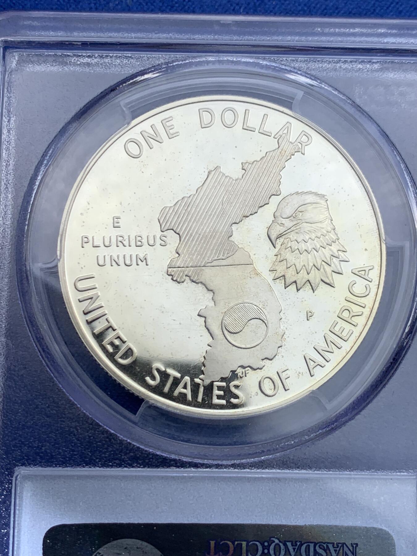 《竞宝斋》第358场 周日，周一  2场连拍 （全场包邮） PCGS PR69DCAM 美国1991年朝战结束38周年纪念银币 正面是海陆空三军，背面是朝韩地图，以纪念那些在朝战中服役的人。PROOF镜面状态精制币，PC盒经典小白盒老盒。