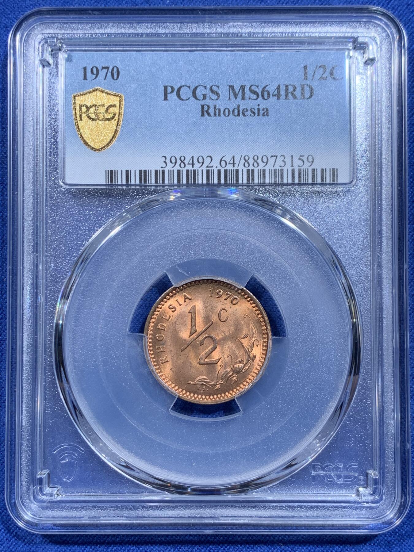 《竞宝斋》第359场 周日，周一  2场连拍 （全场包邮） PCGS MS64RD 罗德西亚1970年半分小铜币 RD状态很难的 两面柔和转光 国徽浮雕感很强 富有非洲风情 可藏！