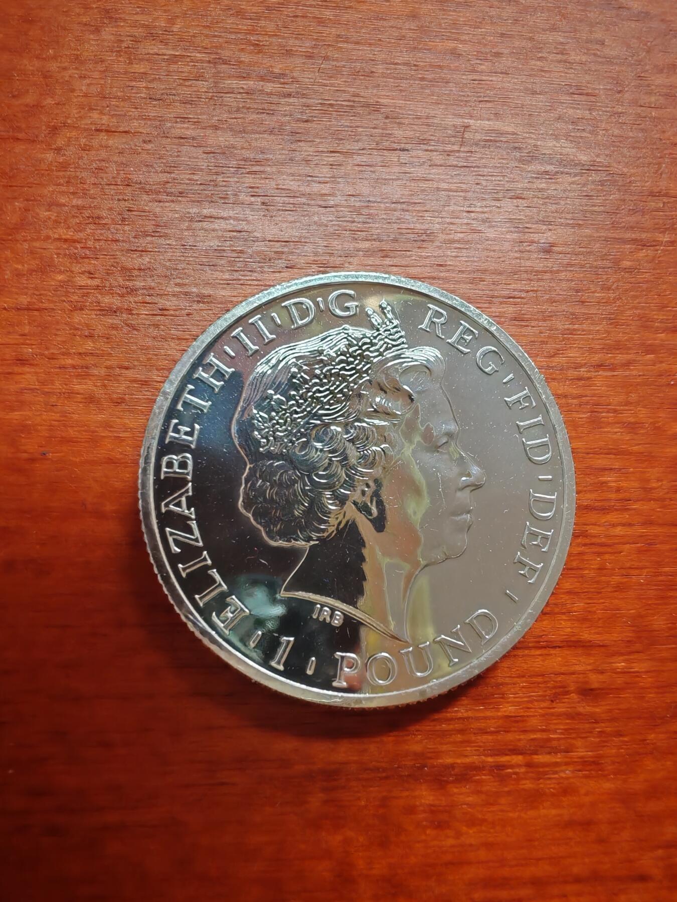 长老汇蛇年精选第六场拍卖 2011英国伊丽莎白二世不列颠女神1英镑镀金精制银币，这个极少，常见的是2英镑，克书价格比2英镑的贵多了