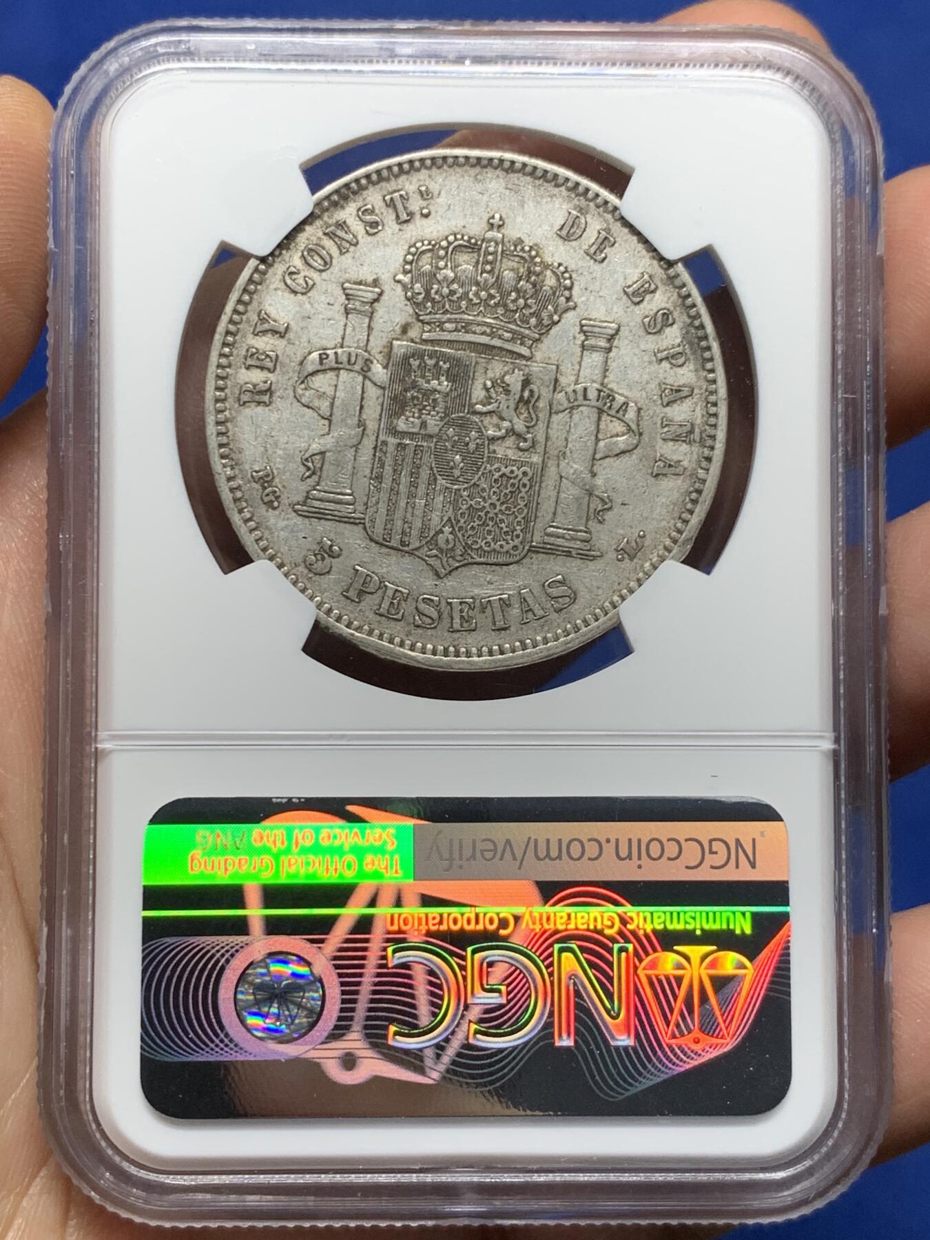 《竞宝斋》第359场 周日，周一  2场连拍 （全场包邮） NGC AUD 西班牙1893年阿方索十三世爆炸头5比塞塔银币，包浆是原味的，但是没给分。