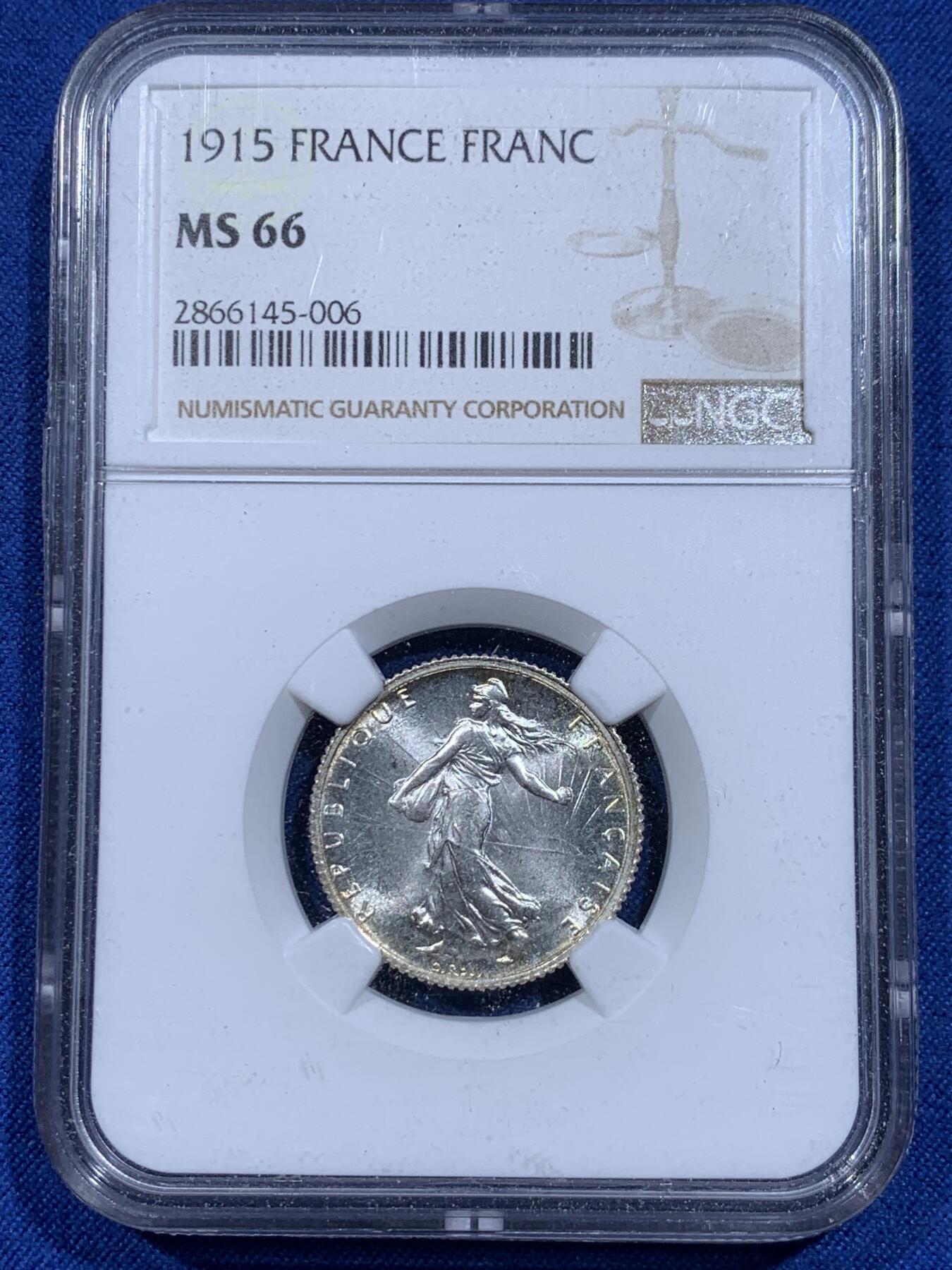 《竞宝斋》第359场 周日，周一  2场连拍 （全场包邮） NGC MS66 法国1915年播种女神1法郎银币 出自大名鼎鼎的章牌雕刻师O.roty之手，最美的近代法系银币之一，超高分顶级状态，炫目丝绸霜光，黄油氧化环彩，底板打制一流，实物美丽，新盒老号