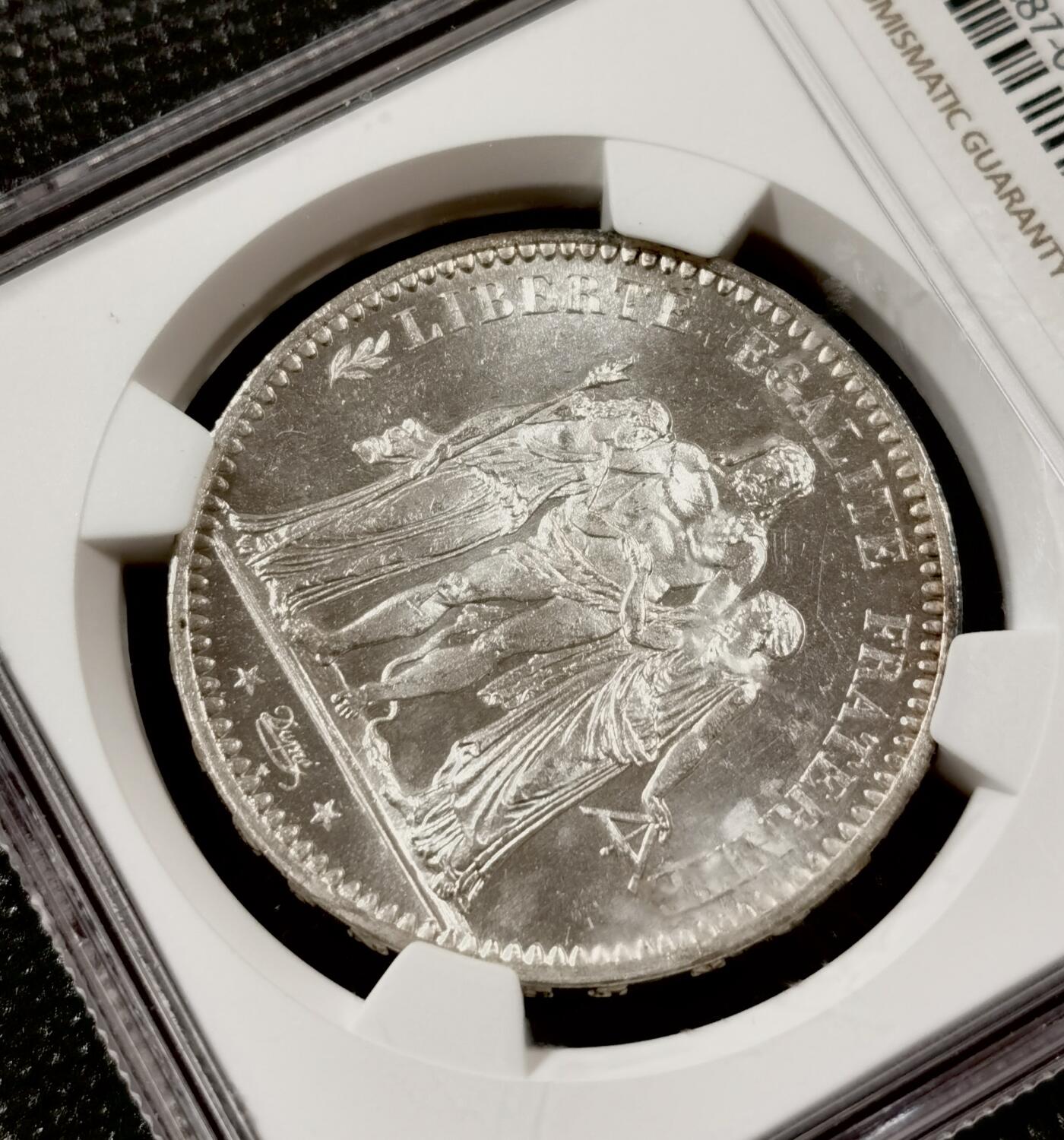 甄臻铺-世界钱币拍卖（第7期）新铺开张，欢迎捧场 NGC-MS65 1873年法国大力神5法郎，极高分，麦稀奇少见，PL质感，重评可能带PL