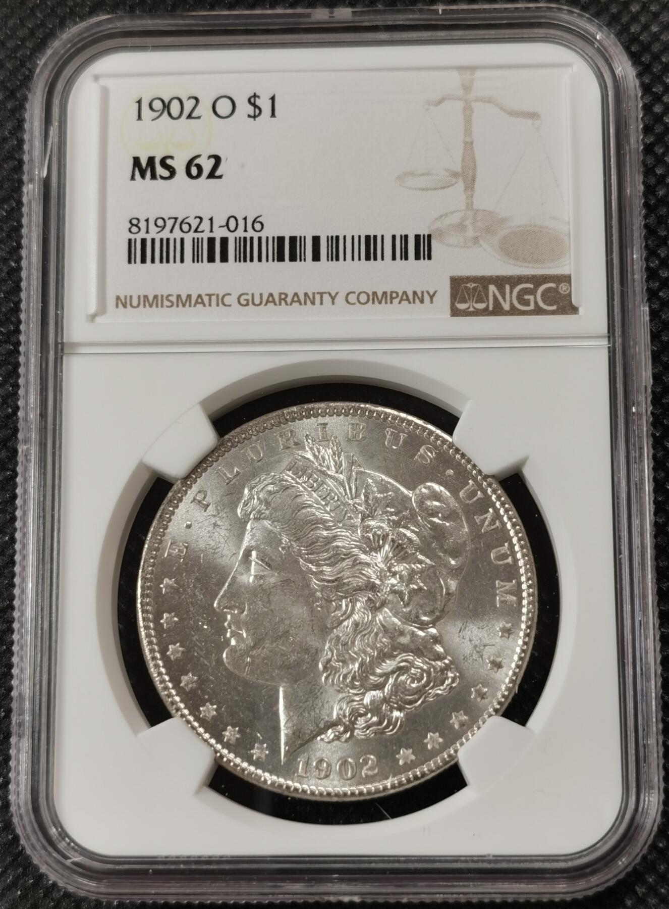 甄臻铺-世界钱币拍卖（第7期）新铺开张，欢迎捧场 NGC-MS62 1902年O版摩根，低评，暴力转光