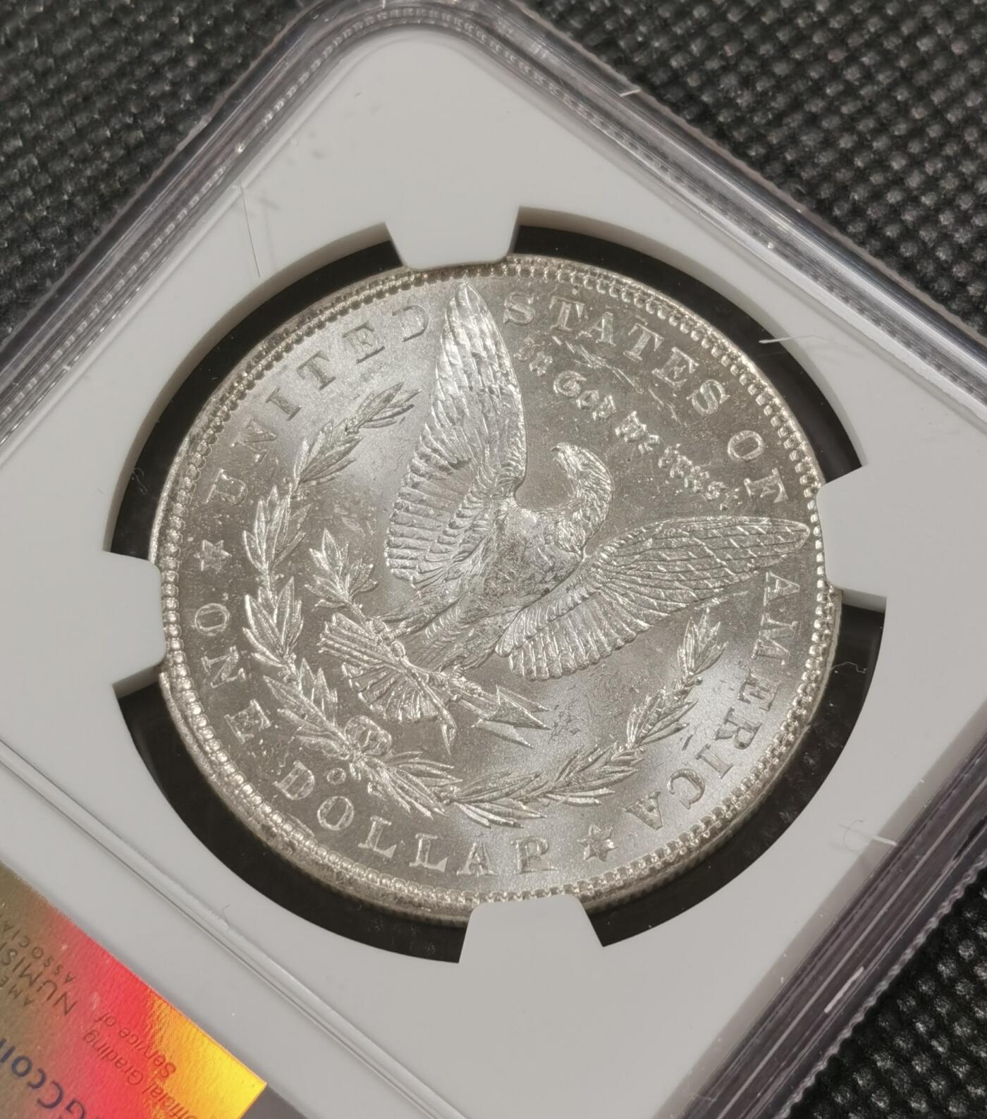 甄臻铺-世界钱币拍卖（第7期）新铺开张，欢迎捧场 NGC-MS62 1902年O版摩根，低评，暴力转光