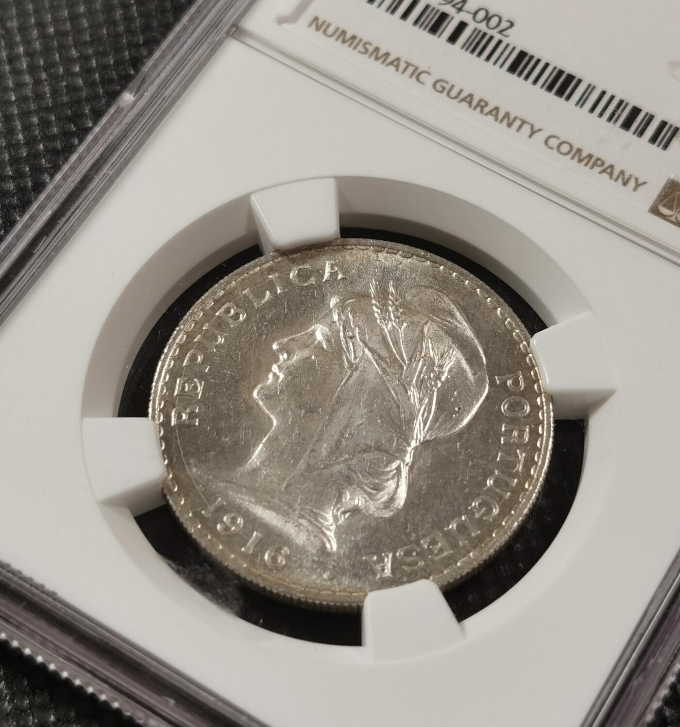 甄臻铺-世界钱币拍卖（第7期）新铺开张，欢迎捧场 NGC-MS62 1916年葡萄牙50分，女神像柔美气概，历史韵味，值得收藏