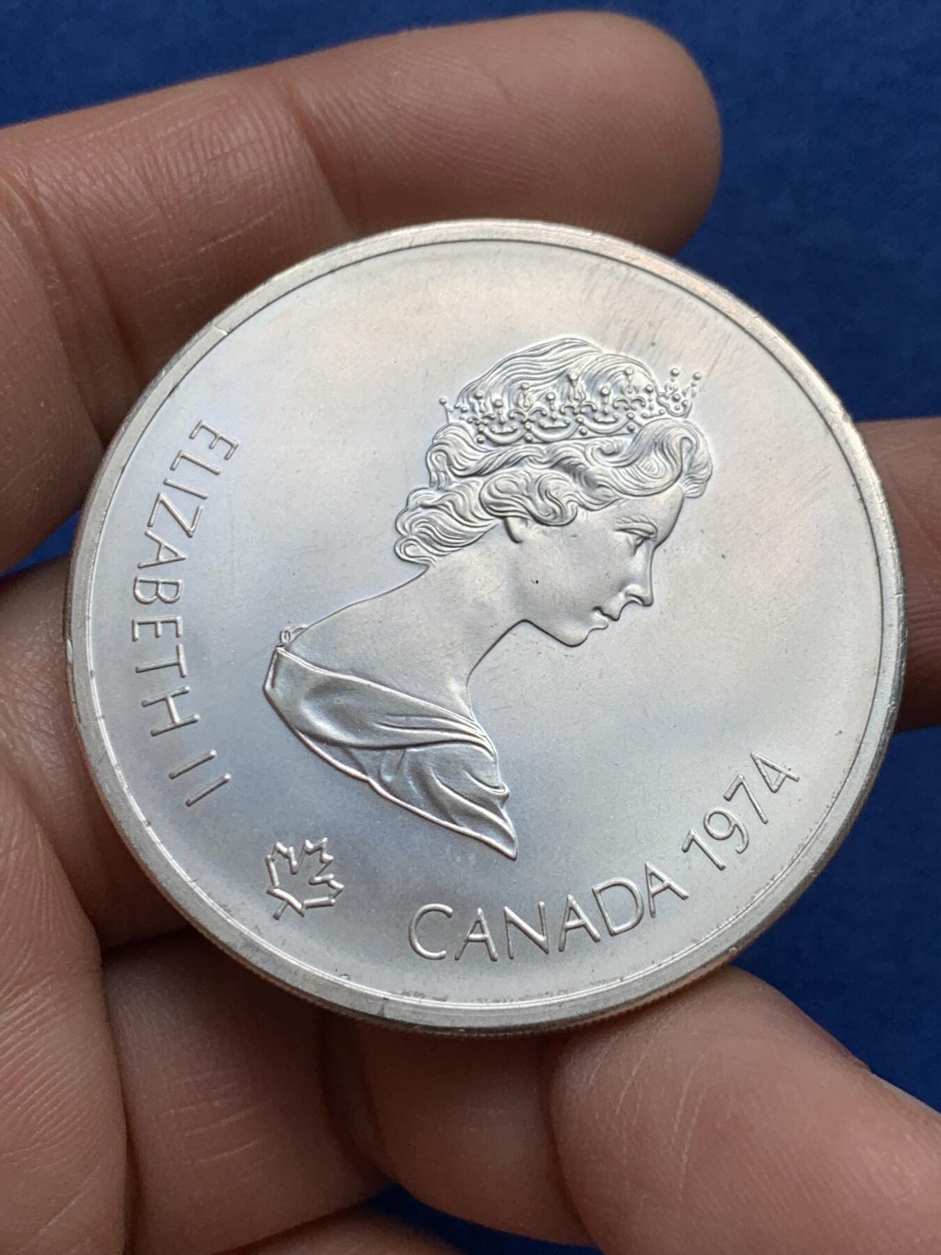 《竞宝斋》第360场 周日，周一  2场连拍 （全场包邮） 加拿大1976年奥运会宙斯纪念银币 重量48.6克 含银量925 细节见图