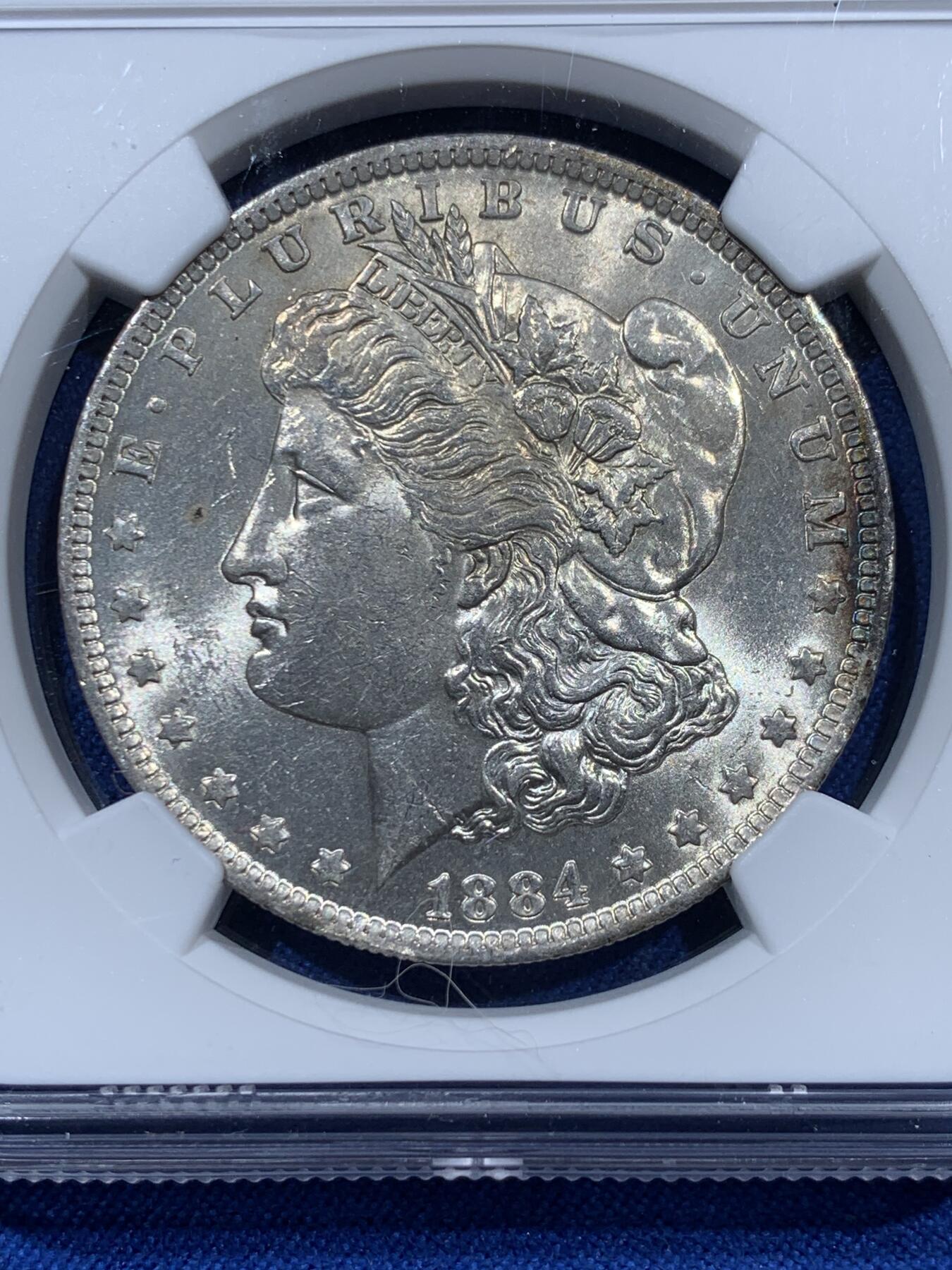 《竞宝斋》第360场 周日，周一  2场连拍 （全场包邮） NGC MS63 美国1884年O版摩根1美元银币  N标签年份标错