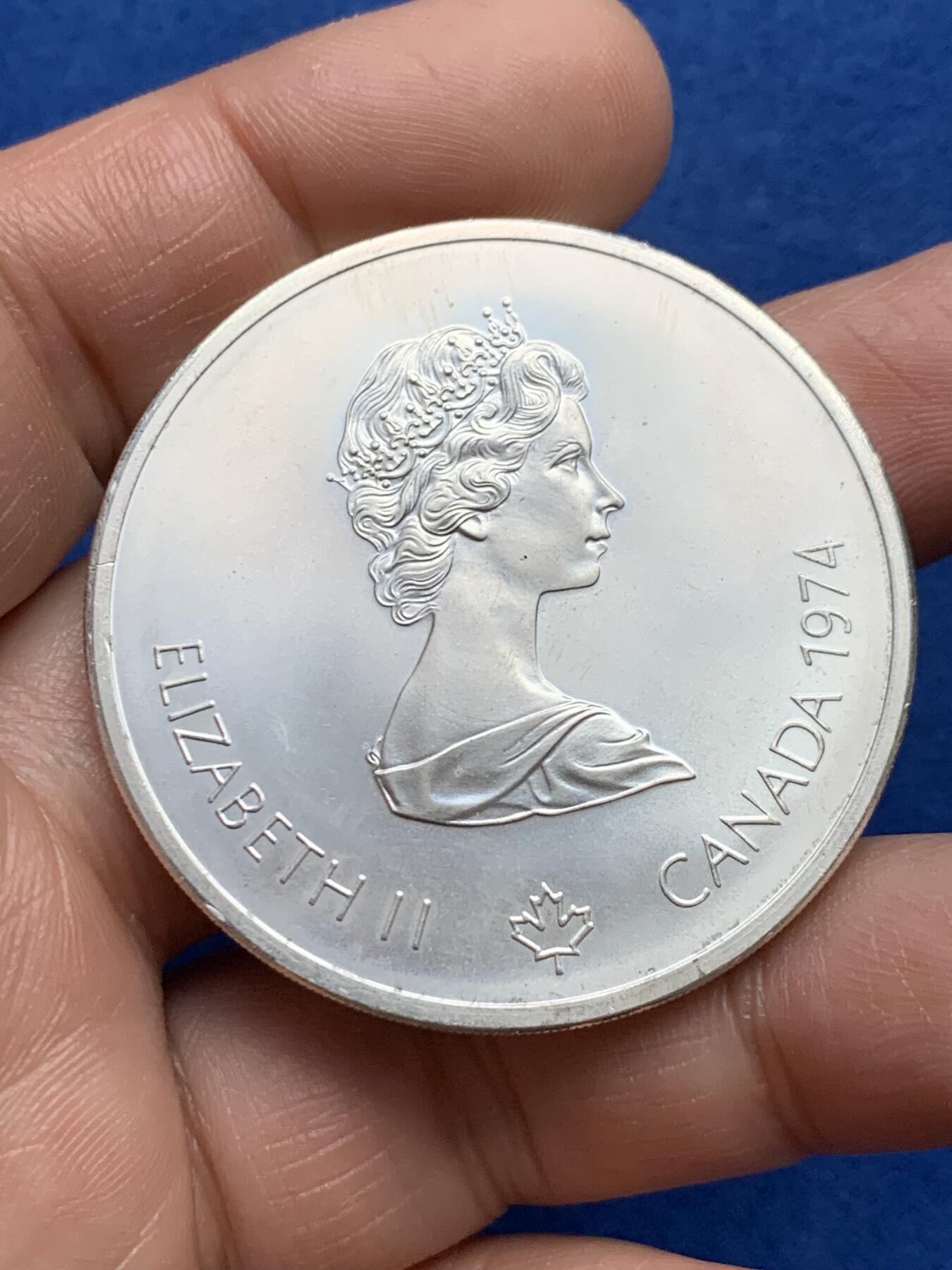 《竞宝斋》第360场 周日，周一  2场连拍 （全场包邮） 加拿大1976年奥运会宙斯纪念银币 重量48.6克 含银量925 细节见图