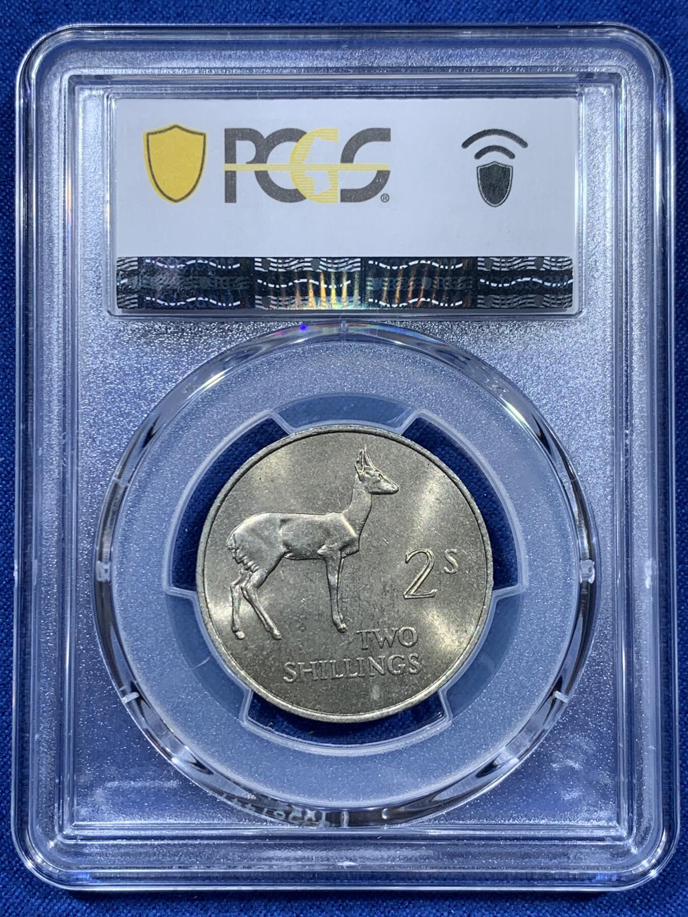 《竞宝斋》第360场 周日，周一  2场连拍 （全场包邮） PCGS MS64 赞比亚1964年2先令 热门非洲品种 好品的非常少见 这枚BU状态 64有点低评了 性价比高