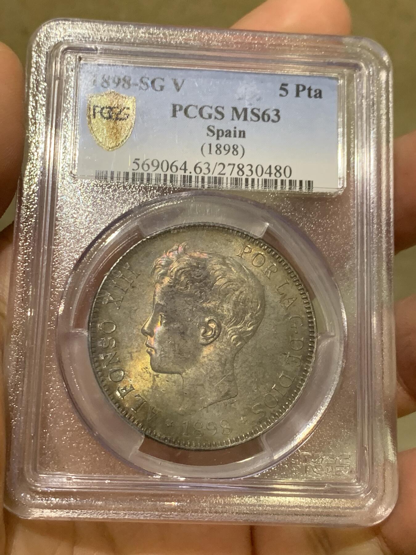 《竞宝斋》第360场 周日，周一  2场连拍 （全场包邮） PCGS MS63 西班牙1898年阿方索十三世小孩头双柱5比赛塔大银币，正反两面均有五彩包浆