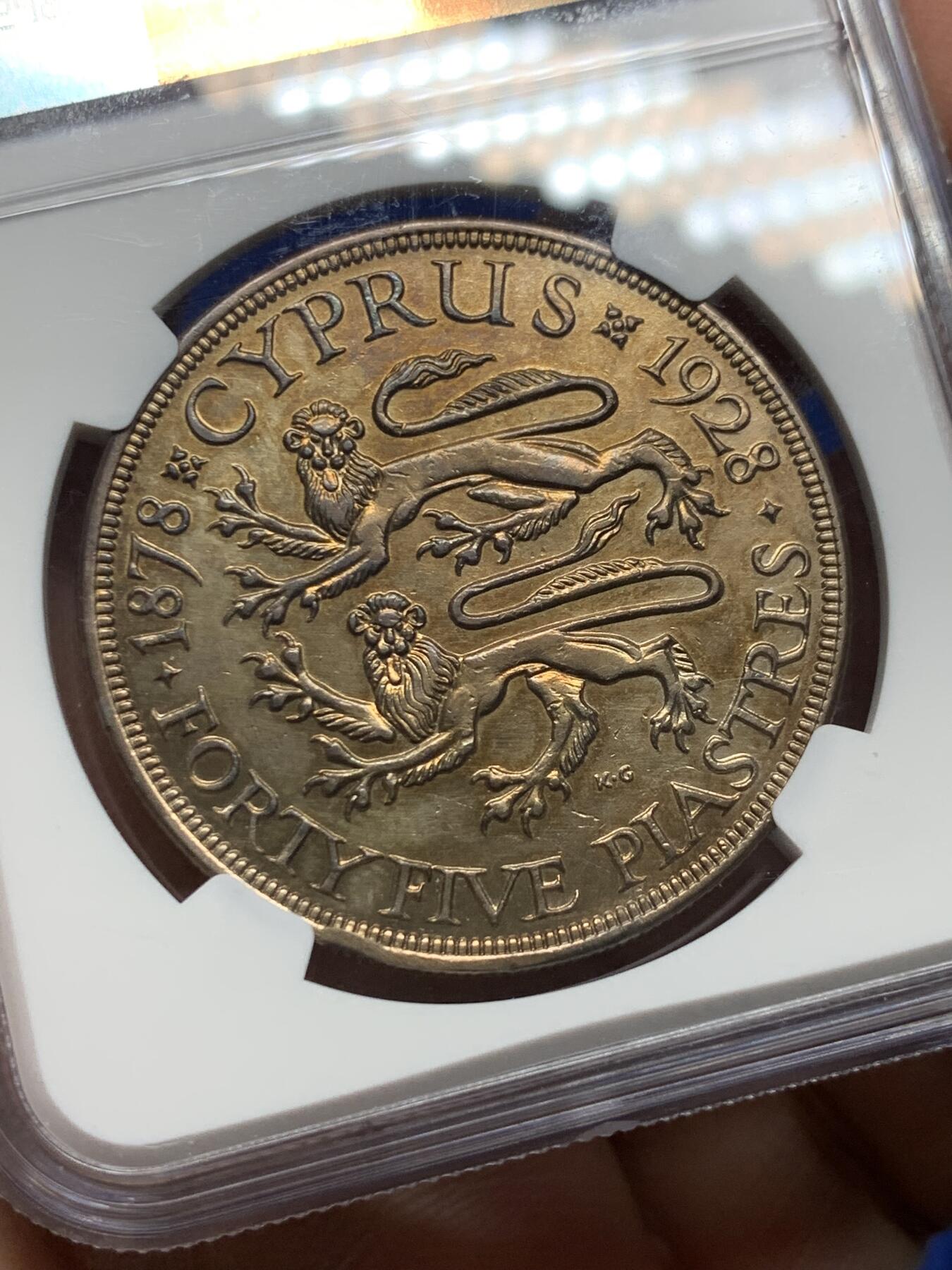 《竞宝斋》第360场 周日，周一  2场连拍 （全场包邮） NGC AUD 1928年英属塞浦路斯45P银币  币面高点俱在，淡金色包浆，好品稀少发行量仅有八万枚。