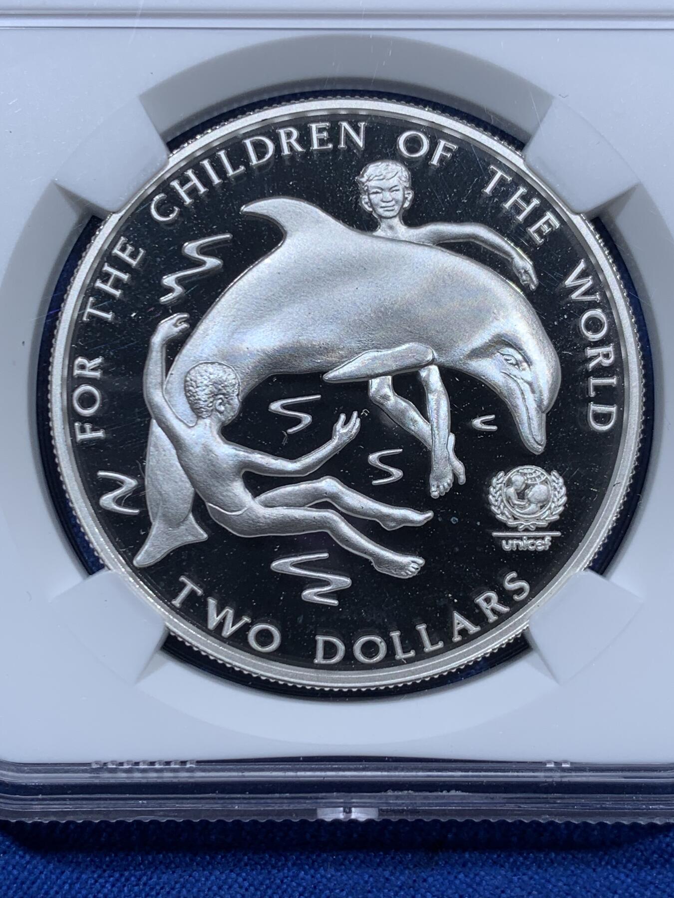 《竞宝斋》第360场 周日，周一  2场连拍 （全场包邮） NGC PF69UC 巴哈马1997年联合国儿童基金会婴戏海豚2元银币