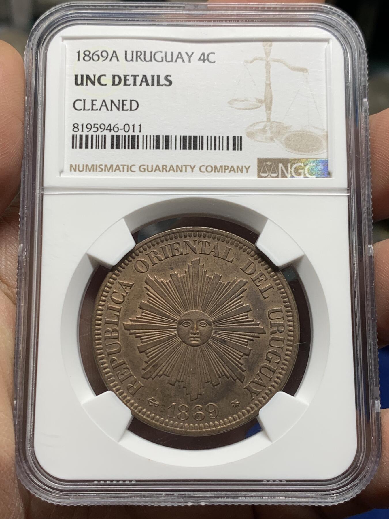 《竞宝斋》第360场 周日，周一  2场连拍 （全场包邮） NGC UNC 1869A 乌拉圭4分大铜币，稀少版别知名的A厂出品发行量最少， 币面笑脸高点俱在，细节到位，值得拥有。