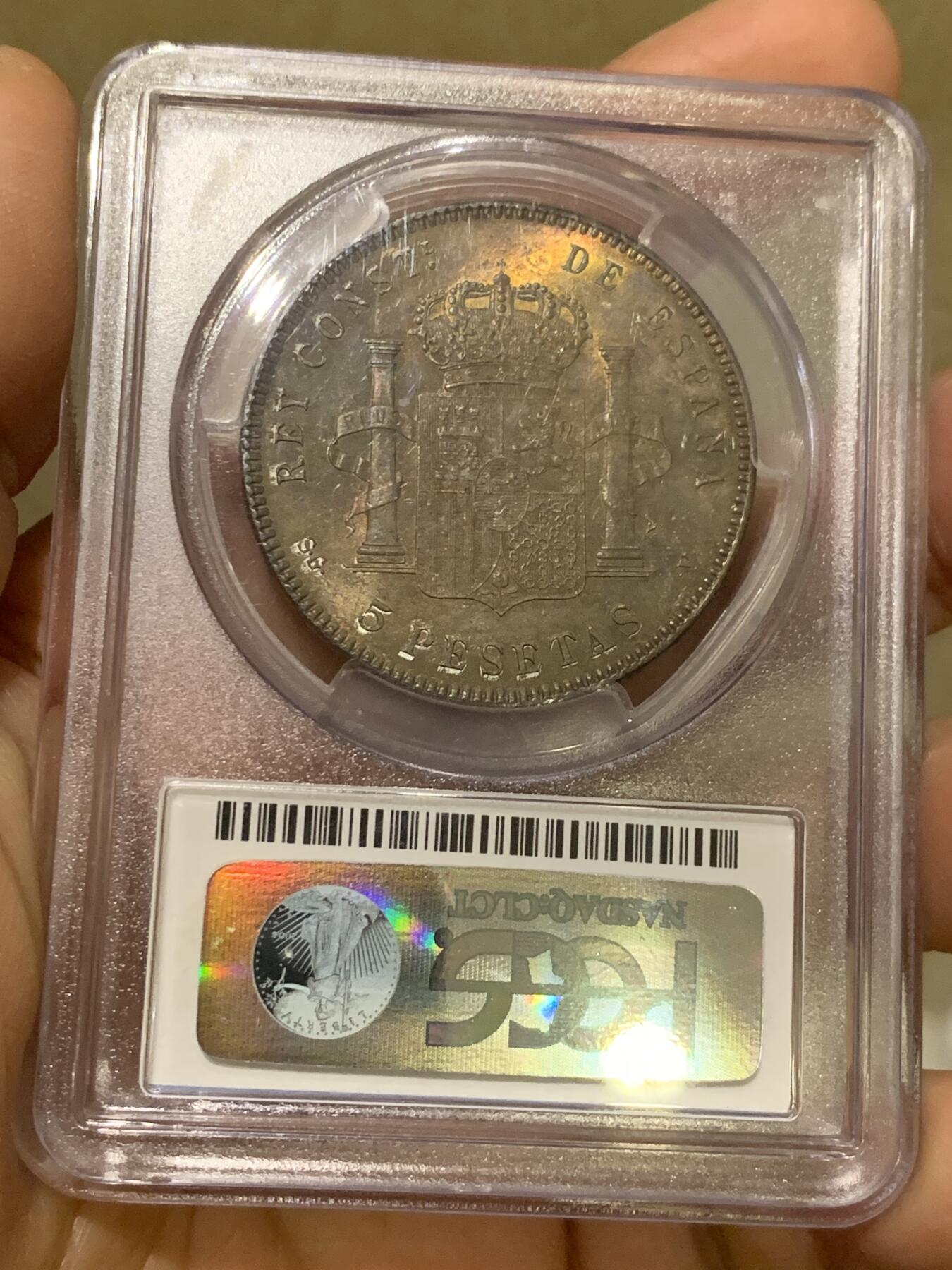 《竞宝斋》第360场 周日，周一  2场连拍 （全场包邮） PCGS MS63 西班牙1898年阿方索十三世小孩头双柱5比赛塔大银币，正反两面均有五彩包浆