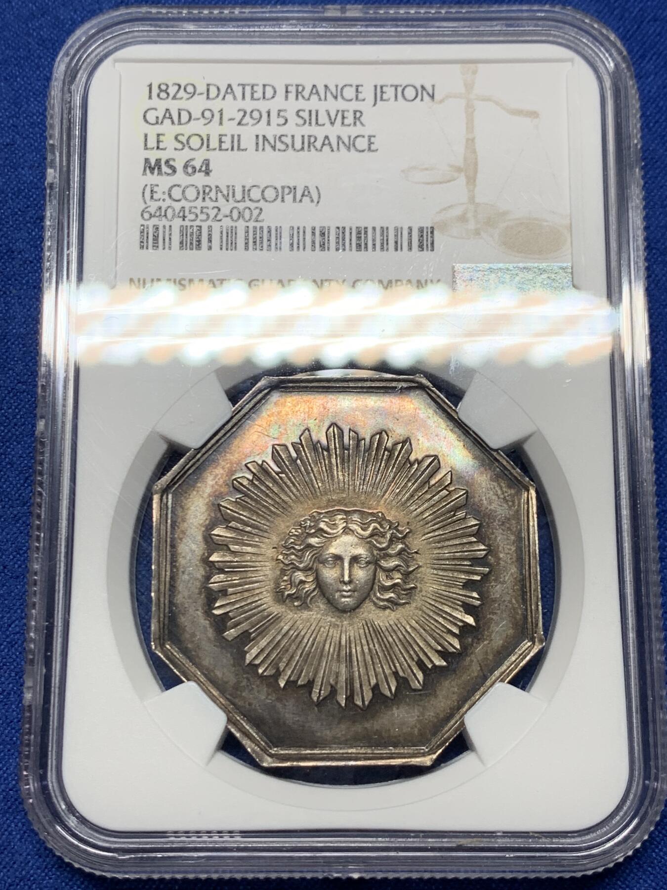 《竞宝斋》第360场 周日，周一  2场连拍 （全场包邮） NGC MS64 超高分 法国太阳保险八角银质代币。五彩包浆，品相佳。