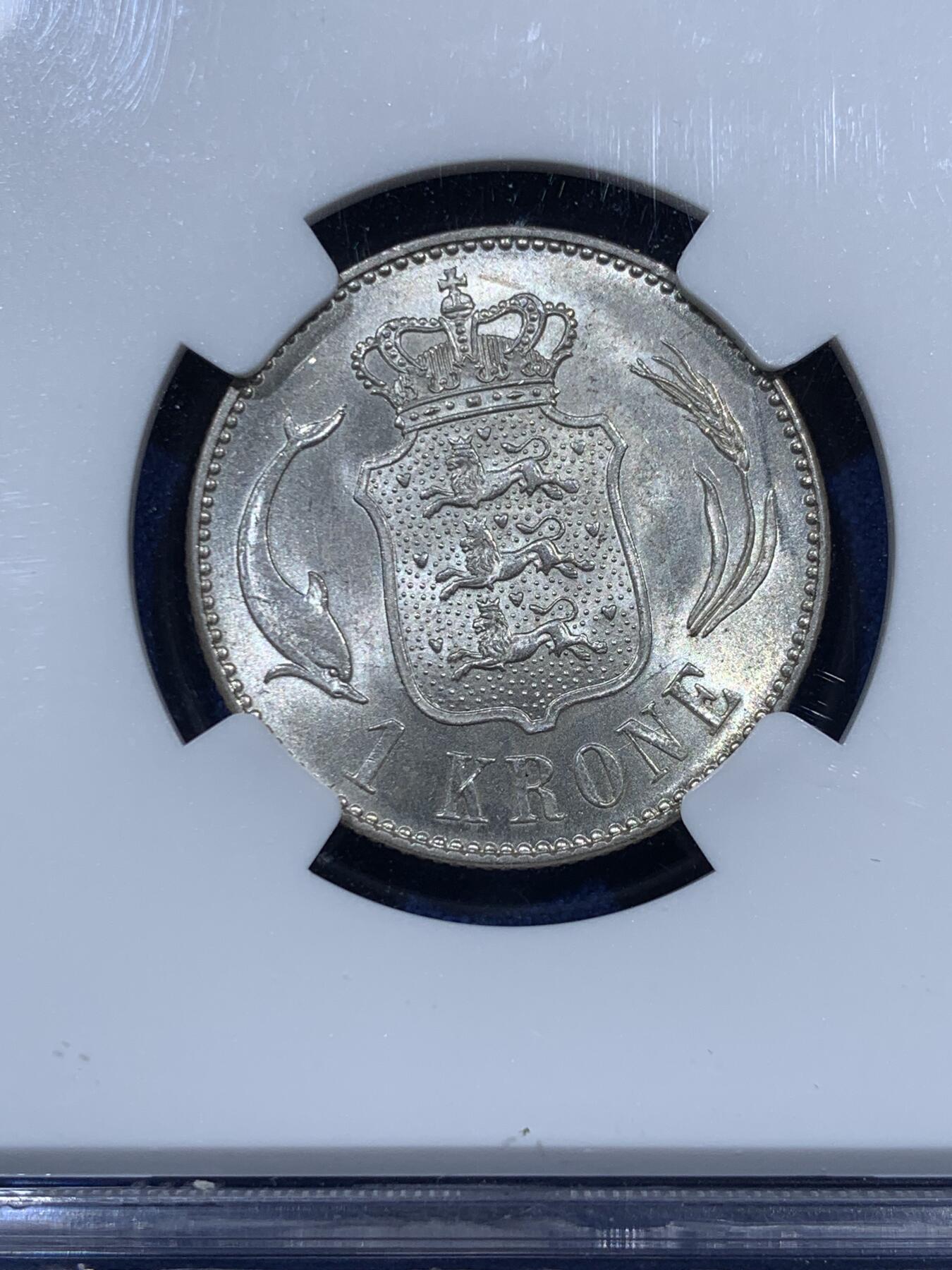 《竞宝斋》第360场 周日，周一  2场连拍 （全场包邮） NGC MS63 丹麦1915年海豚1克朗银币，流通版，仅发行了2年。高分不易，60分参考价55美元。银光粉润，海豚形象灵动可爱