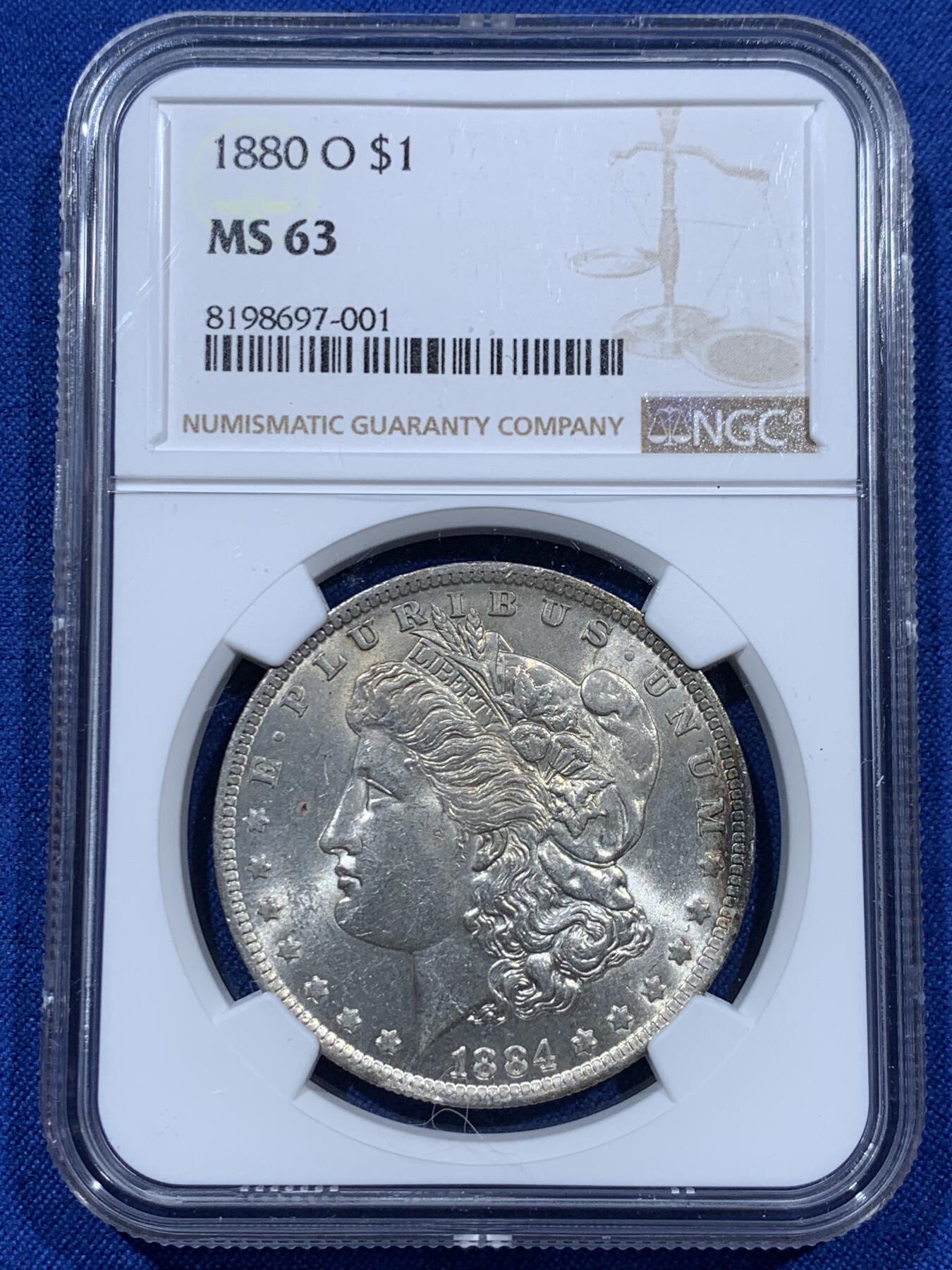 《竞宝斋》第360场 周日，周一  2场连拍 （全场包邮） NGC MS63 美国1884年O版摩根1美元银币  N标签年份标错