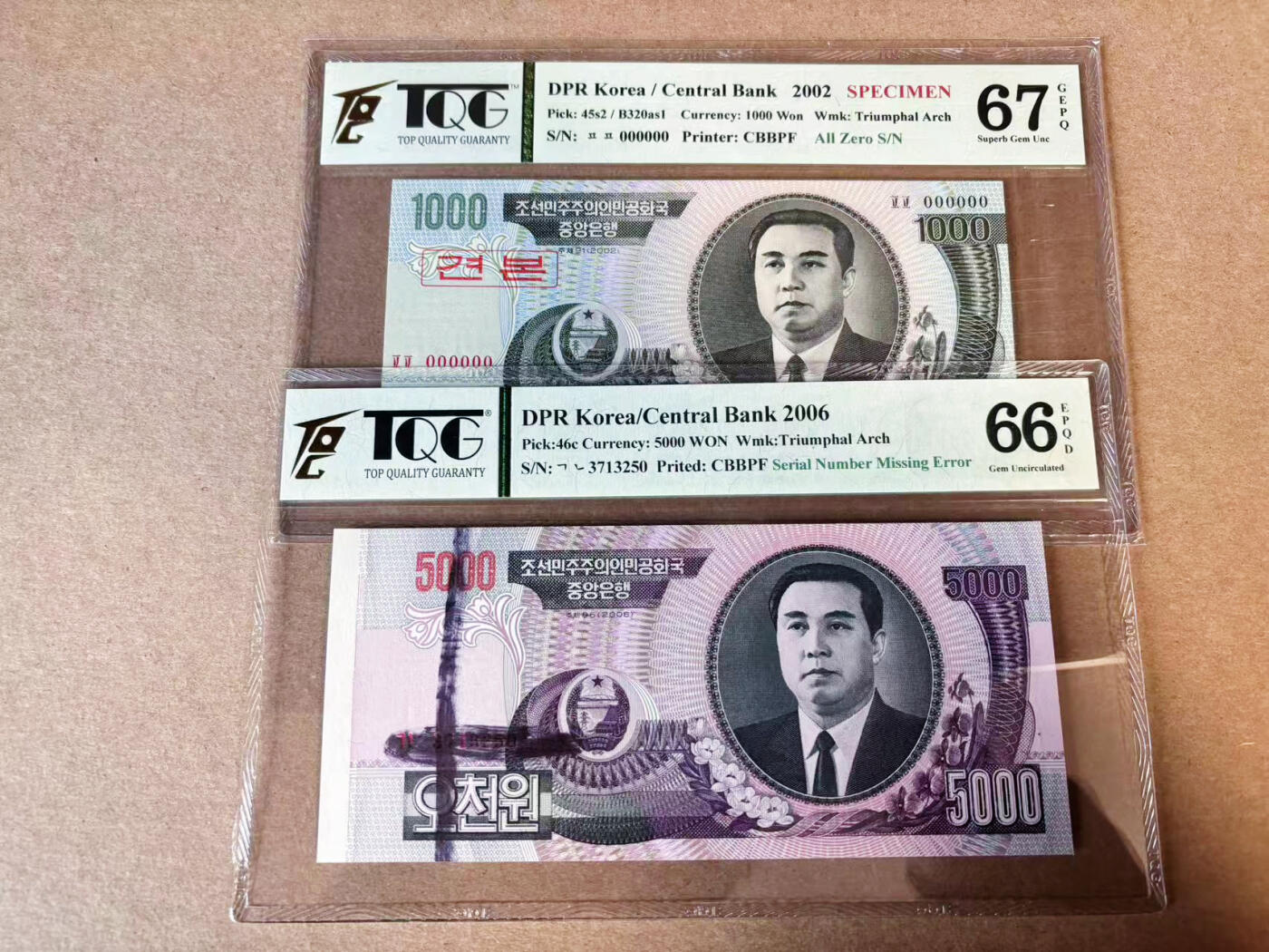 【Blue Auction】✨世界纸币精拍第629期【精】 【一组2张】朝鲜2002年1000元 样票 凯旋门水印&朝鲜2006年5000元错钞 TQG67EPQ/66EPQ 