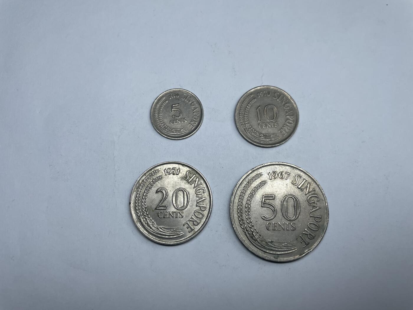 2025年集古藏今外币拍卖第三期-第8场—（总第218拍），可以寄存60天，满160元包邮。 新加坡动物版四枚