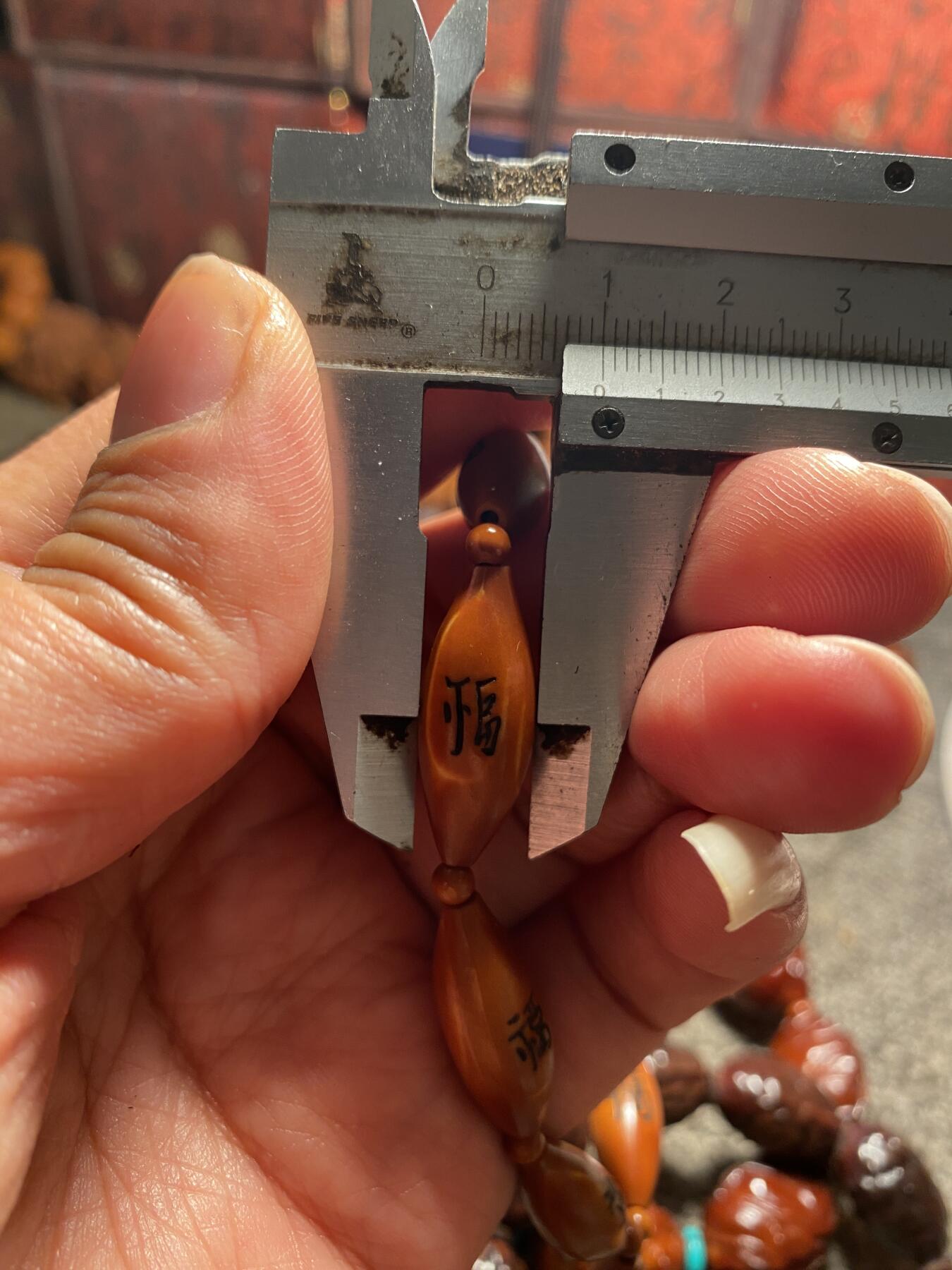 福利苏工核雕纯手工雕刻柳叶百福，双面福立体感十足尺寸0。9x2.55左右稀缺串喜欢的来价格不贵