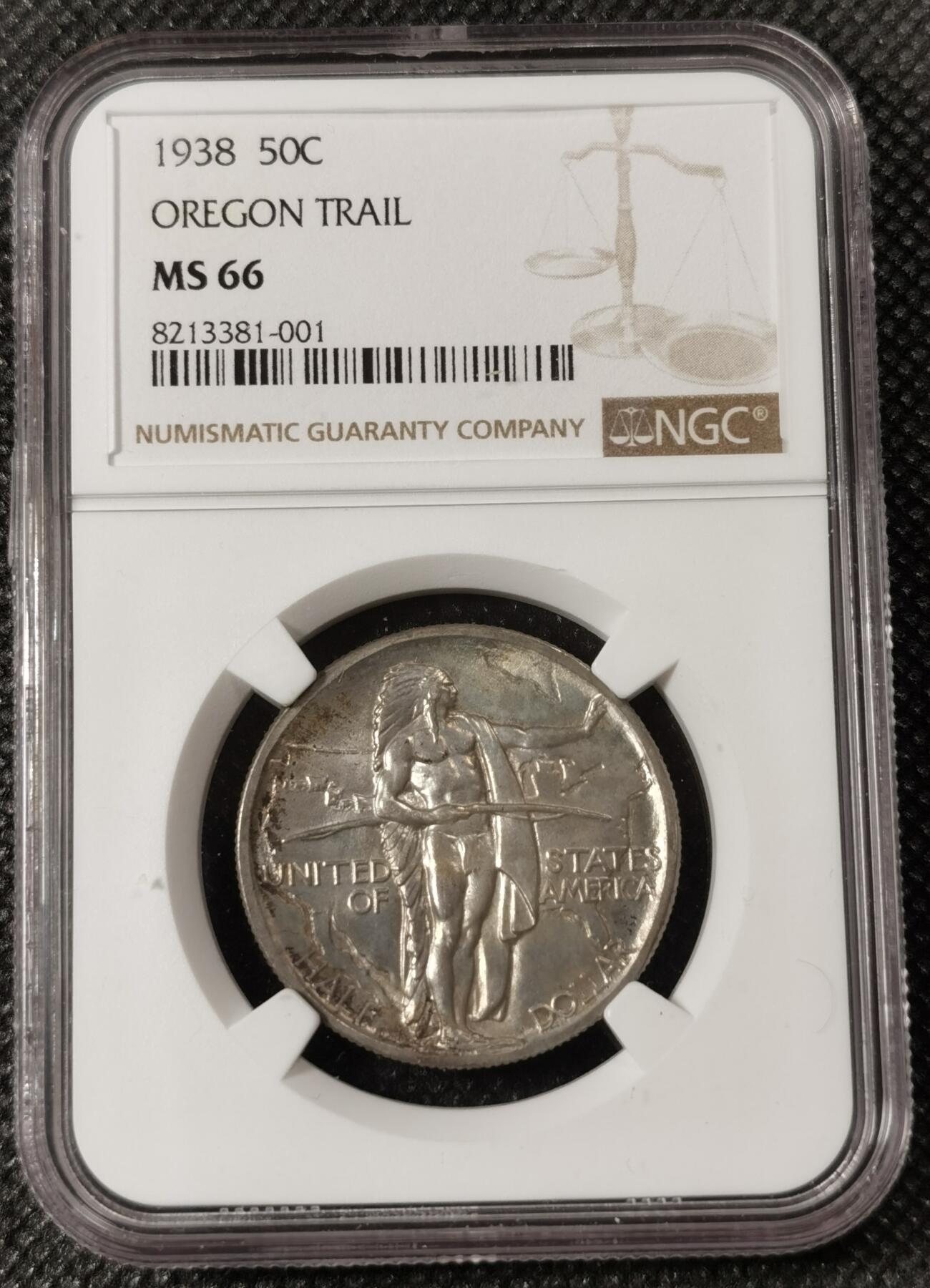 甄臻铺-世界钱币拍卖（第8期）新铺开张，欢迎捧场 NGC-MS66 美国1938年俄勒冈小道50美分银币 经典印第安人加大篷车的设计，半美元系列中最出名的一枚，高分加上淡黄色包浆，名誉品一步到位值得收藏