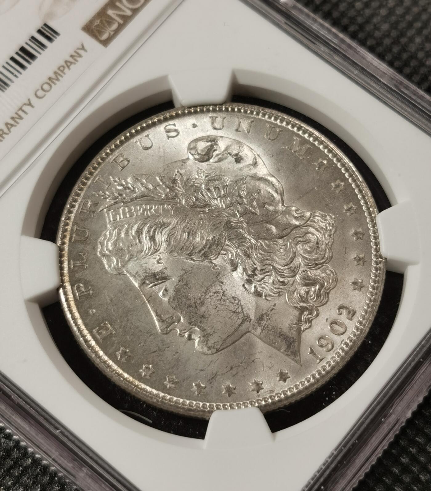 甄臻铺-世界钱币拍卖（第8期）新铺开张，欢迎捧场 NGC-MS63 1902年O版美国摩根