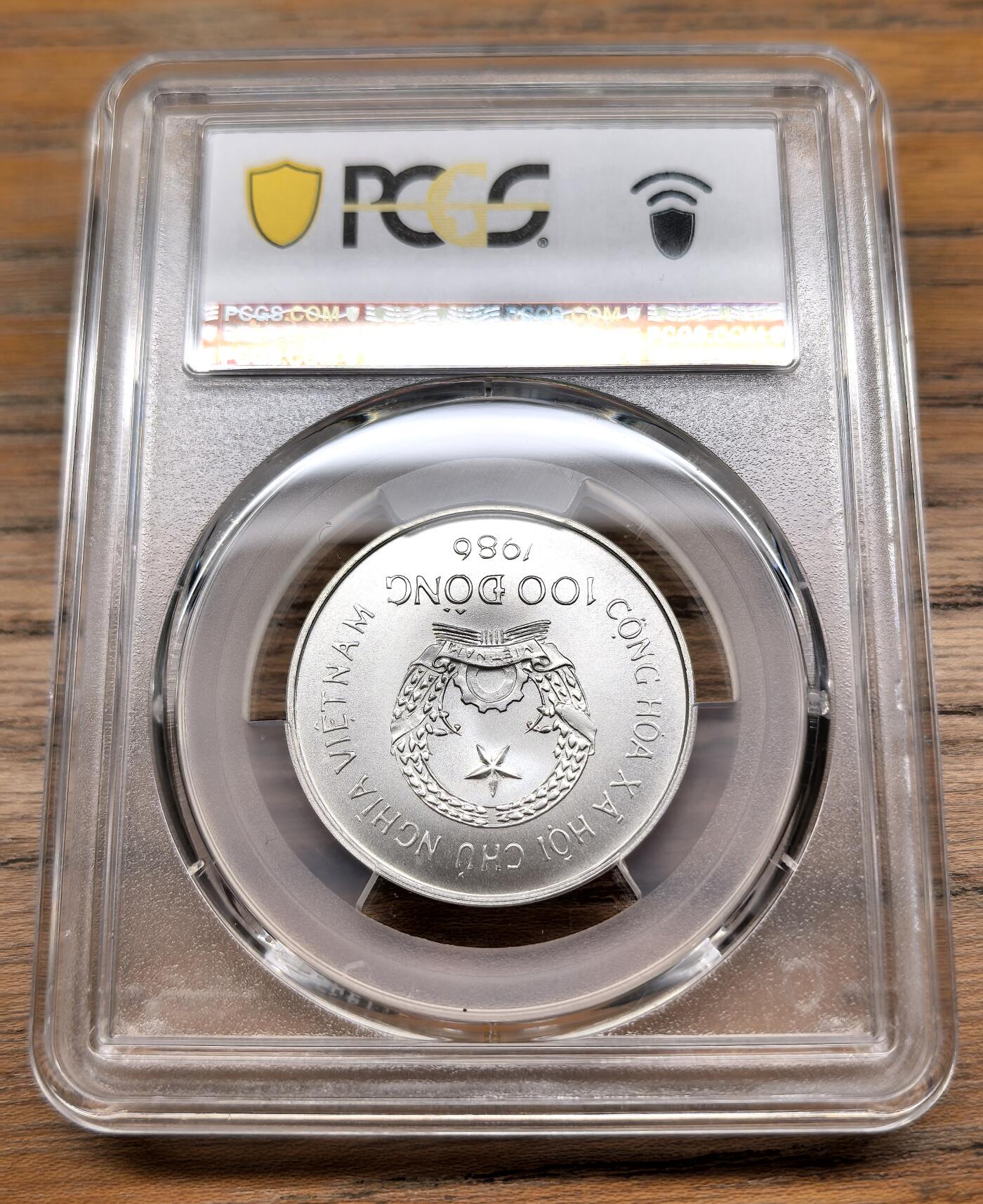凡希社世界钱币微拍第二百九十九期 1986越南卡尔加里冬奥会100D纪念银币PCGS-MS69，发行5000枚。