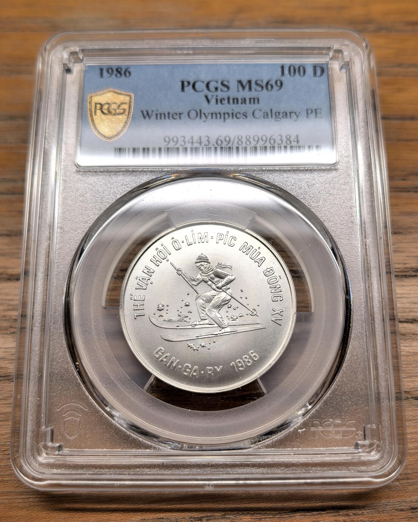 凡希社世界钱币微拍第二百九十九期 1986越南卡尔加里冬奥会100D纪念银币PCGS-MS69，发行5000枚。