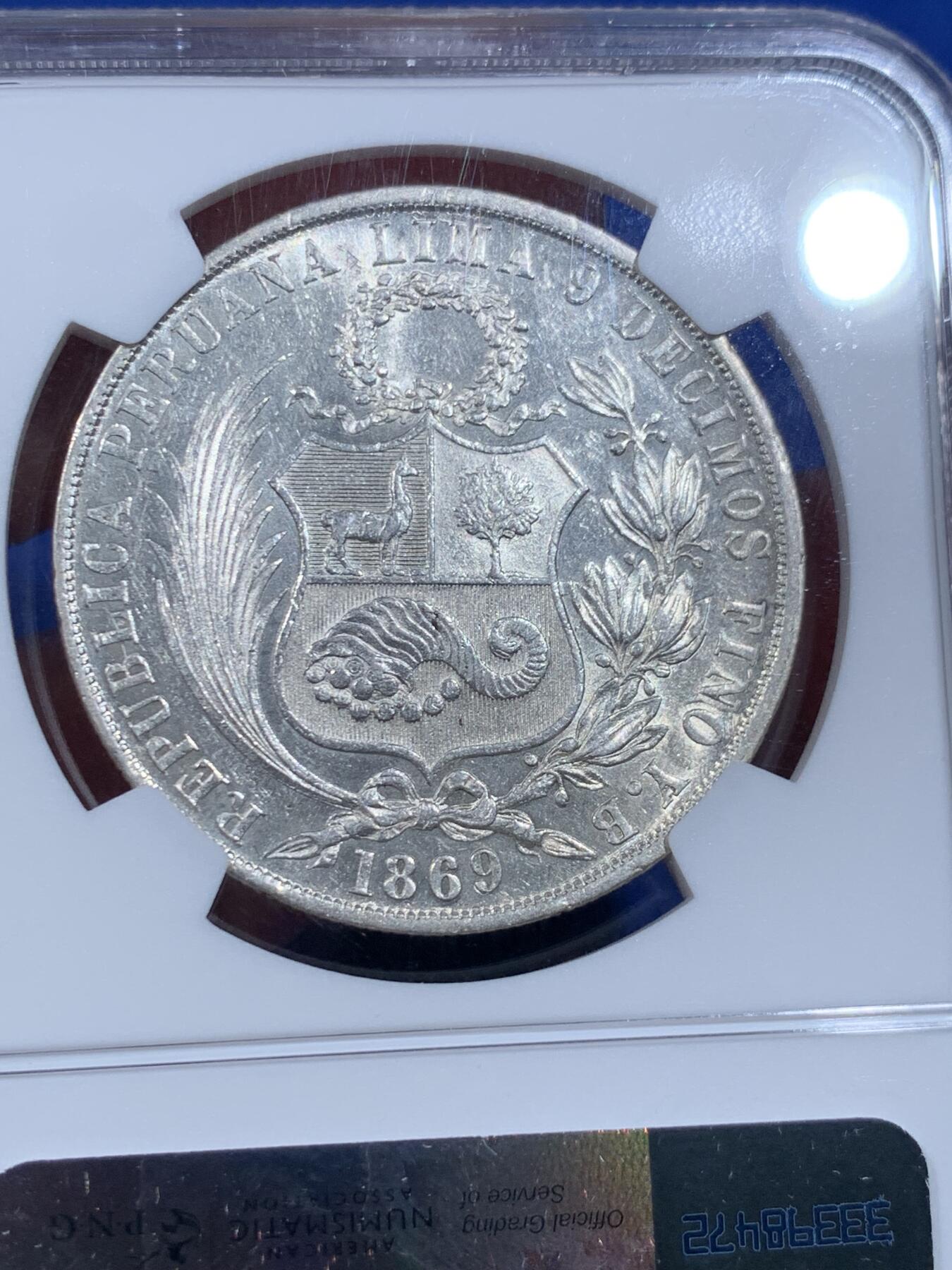 《竞宝斋》第362场 周日，周一，周二  3场连拍 （全场包邮） NGC AU58 秘鲁1869年早期高银版1索尔大银币 早期年份好品少见，光度和细节都很好