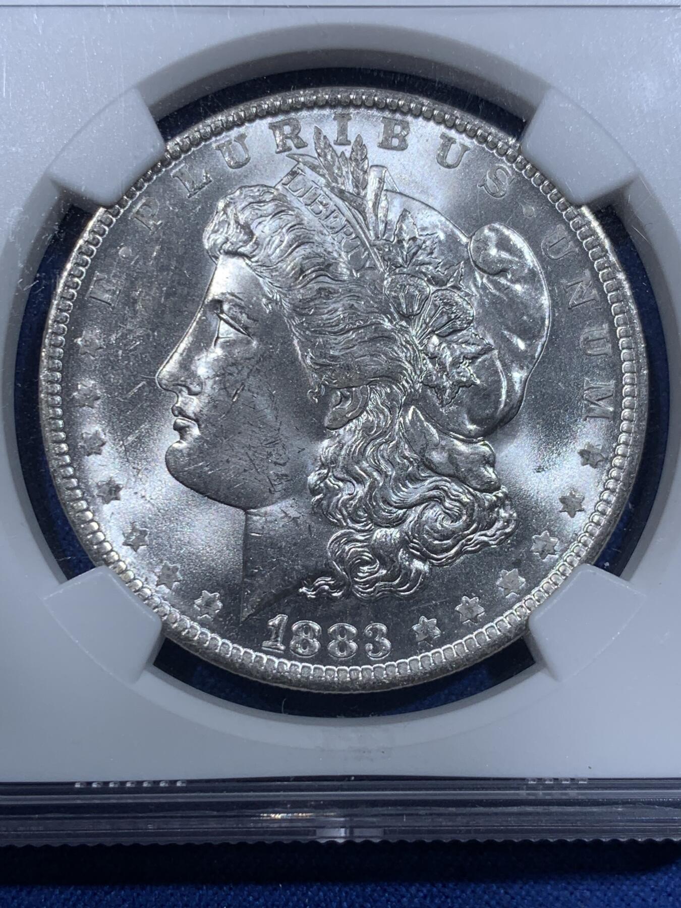 《竞宝斋》第362场 周日，周一，周二  3场连拍 （全场包邮） NGC MS64 美国1883年摩根银币O版银币，转光强烈细节优秀。