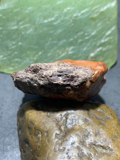 精美柿子红原皮南红玛瑙明料原石一颗 精美柿子红原皮南红玛瑙明料原石一颗