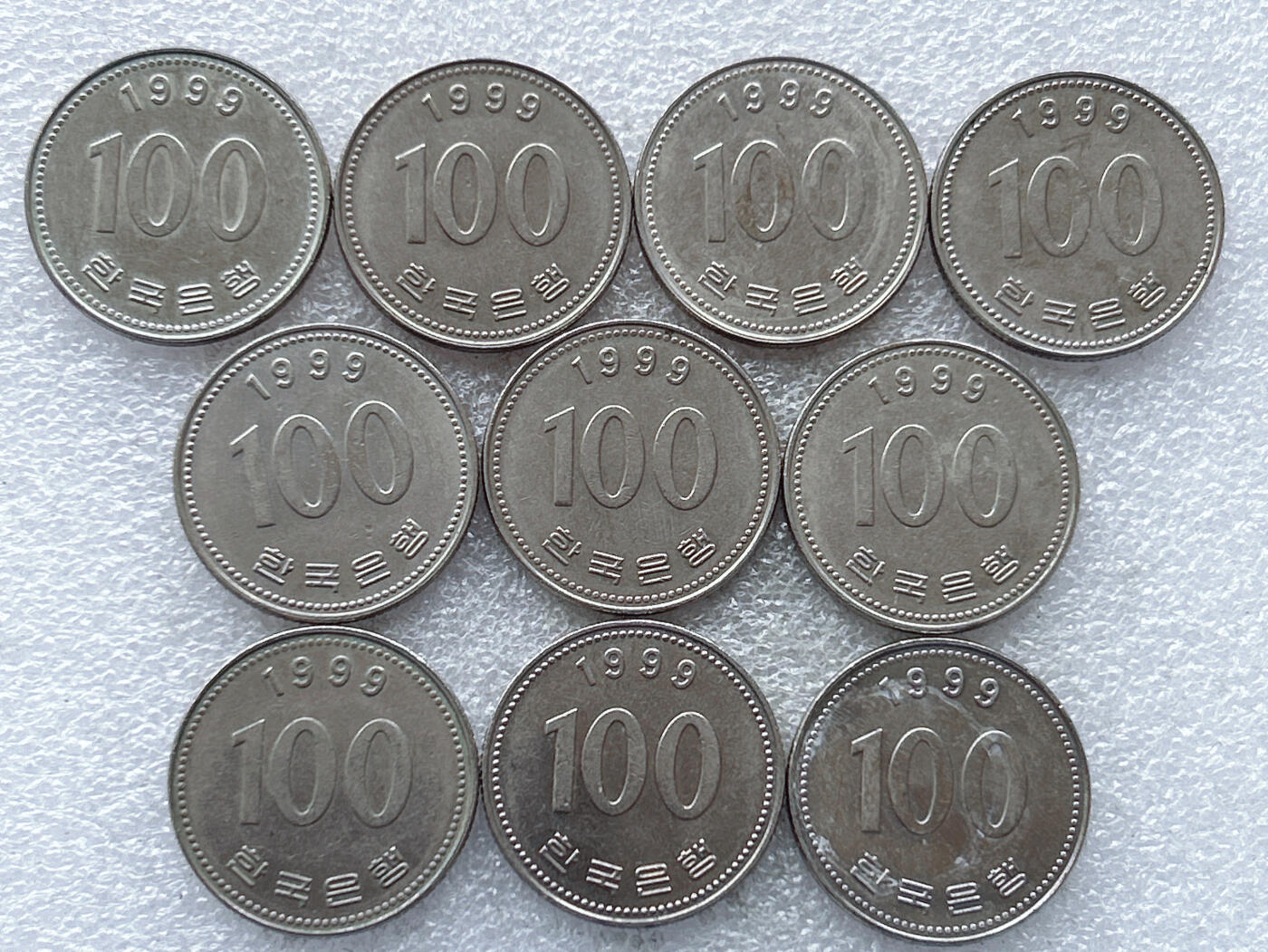 第一海外回流一元起拍收藏 韩国专场. 第182期 韩国1999年100元硬币 10枚